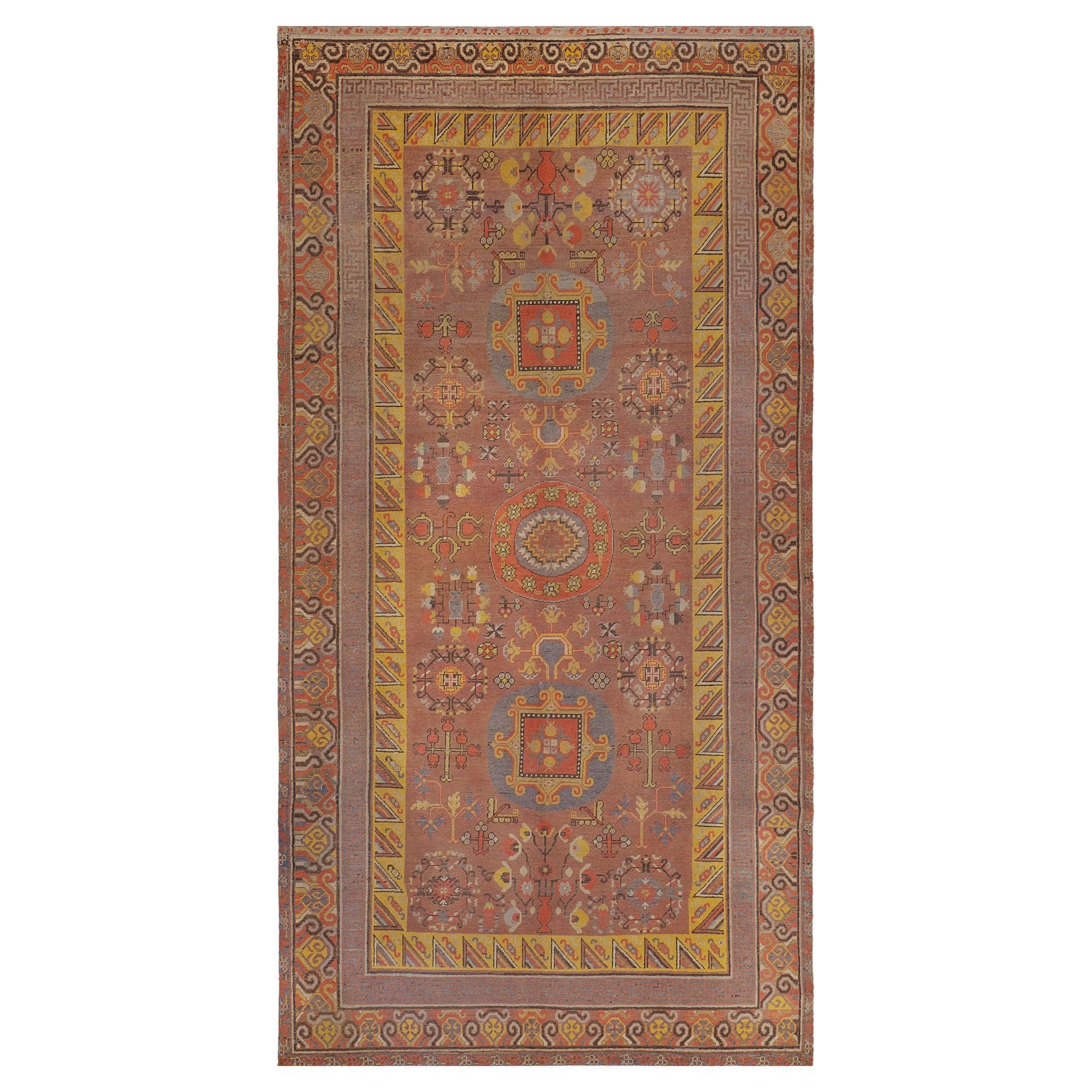 Traditional Hand-Knotted Wool Samarkand Khotan Rug with Auspicious Symbols For Sale