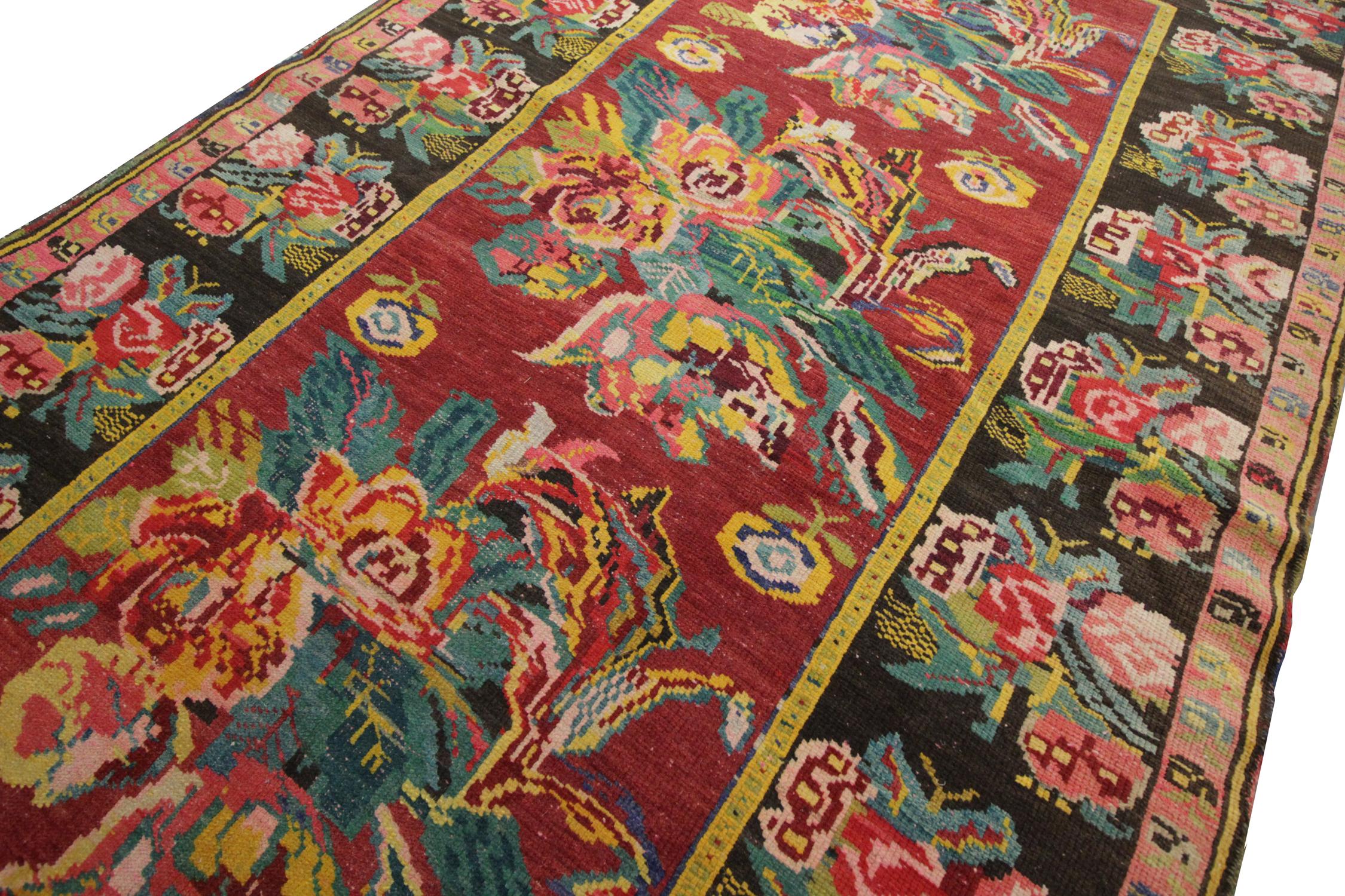 Vivid colours have been used in the construction of this handmade carpet large Karabagah area rug. Greens, pinks, reds and yellows have been handwoven into intricate floral arrangments, on contrasting backgrounds of black and deep red.
The Floral