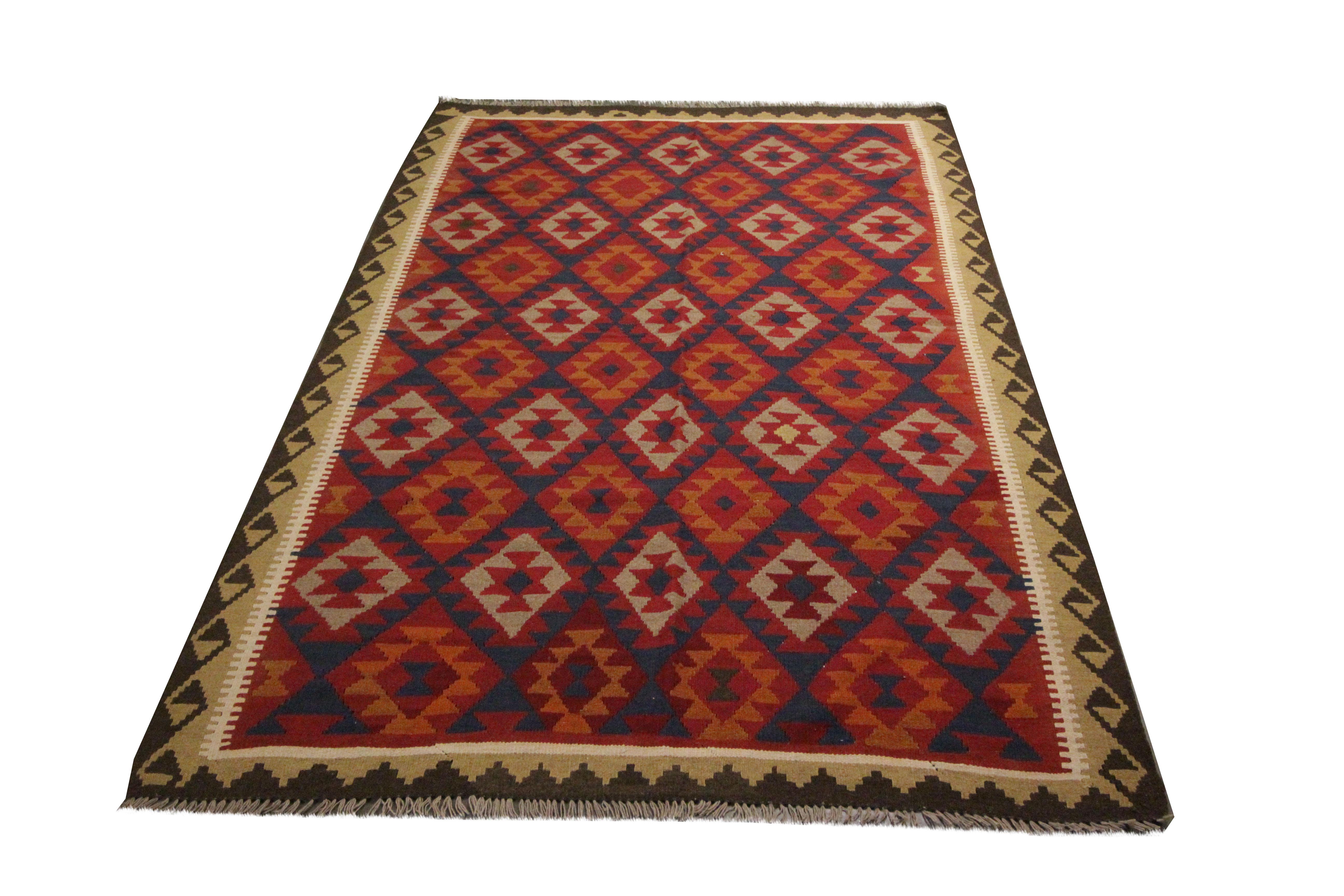 Woven with elegance, this wool kilim rug is sure to uplift any room. The design features an energetic geometric pattern woven with a diamond pattern in orange, blue, and red accents. Both the colours and patterns in this piece make it sure to lift