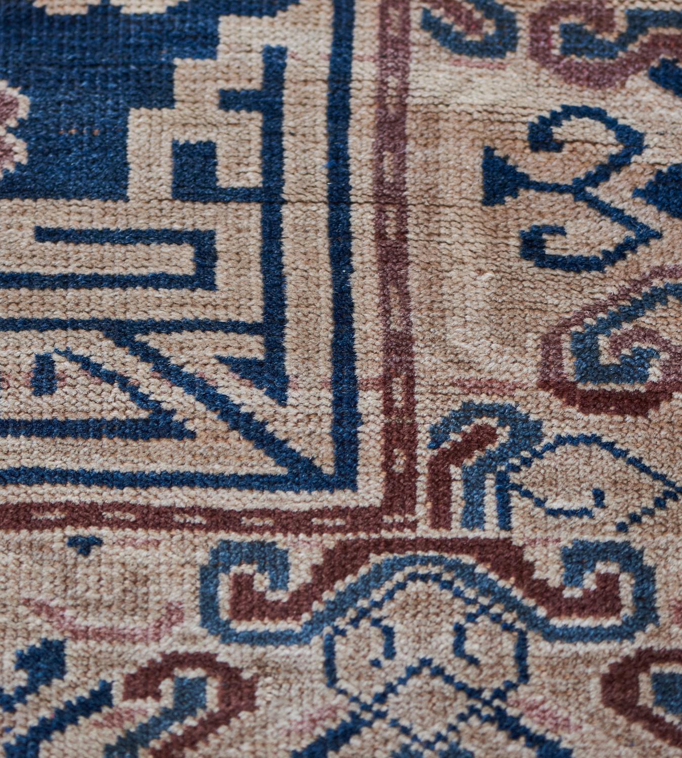 Traditional Handwoven Navy Blue Khotan Rug In Good Condition For Sale In West Hollywood, CA