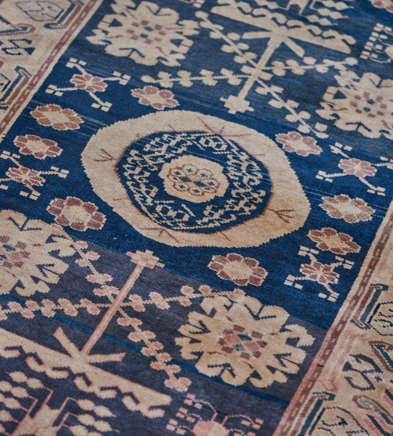 19th Century Traditional Handwoven Navy Blue Khotan Rug For Sale