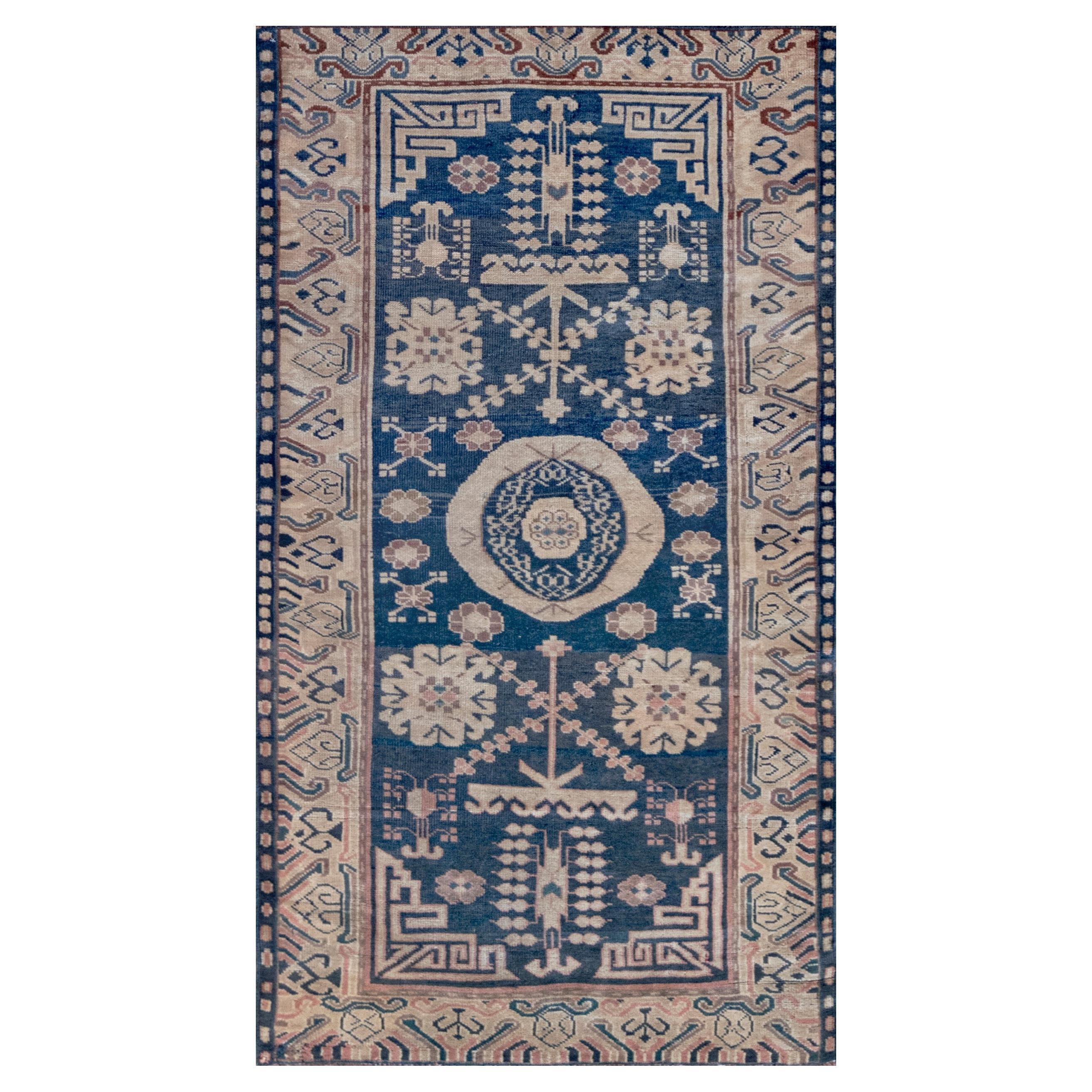 Traditional Handwoven Navy Blue Khotan Rug For Sale