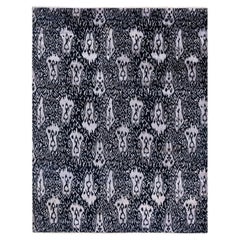 Traditioneller handgeknüpfter, geblümter Ikat-Teppich aus Seide und Wolle in Schwarz, 8' 1" x 10' 4"
