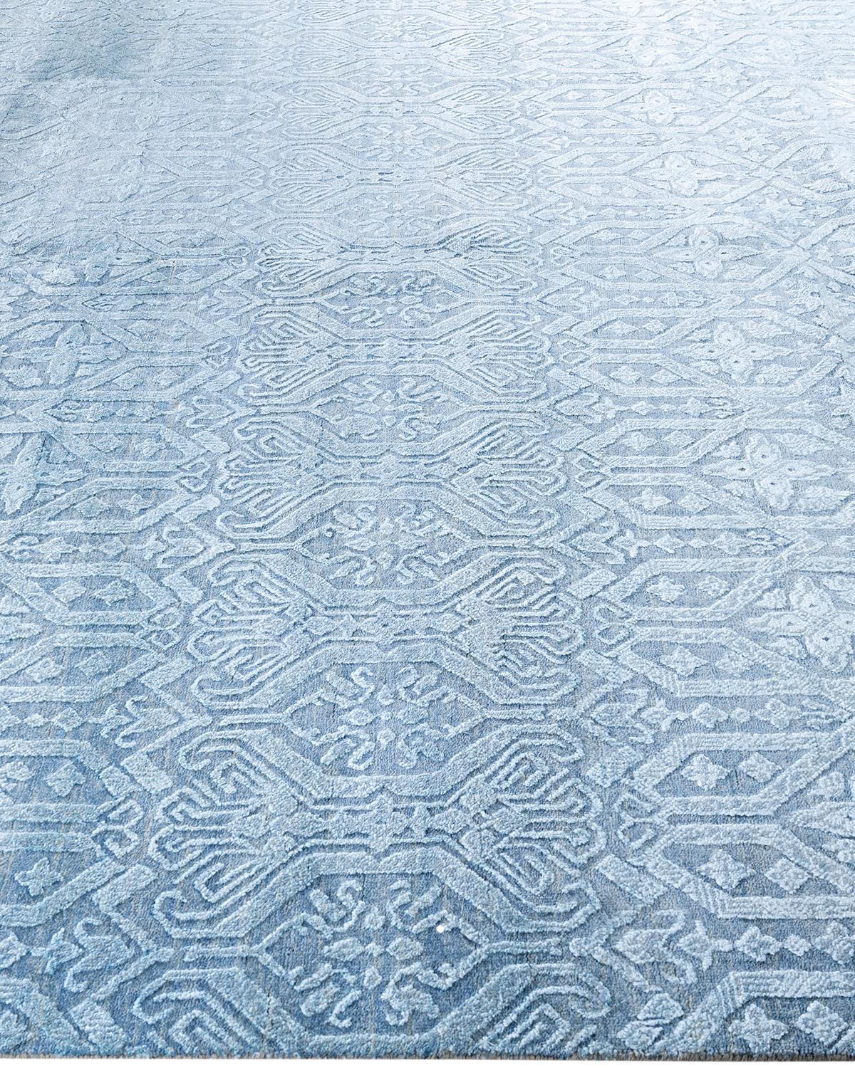 Traditioneller handgeknüpfter, geblümter Ikat-Teppich aus Seide und Wolle in Grau, 8' 1