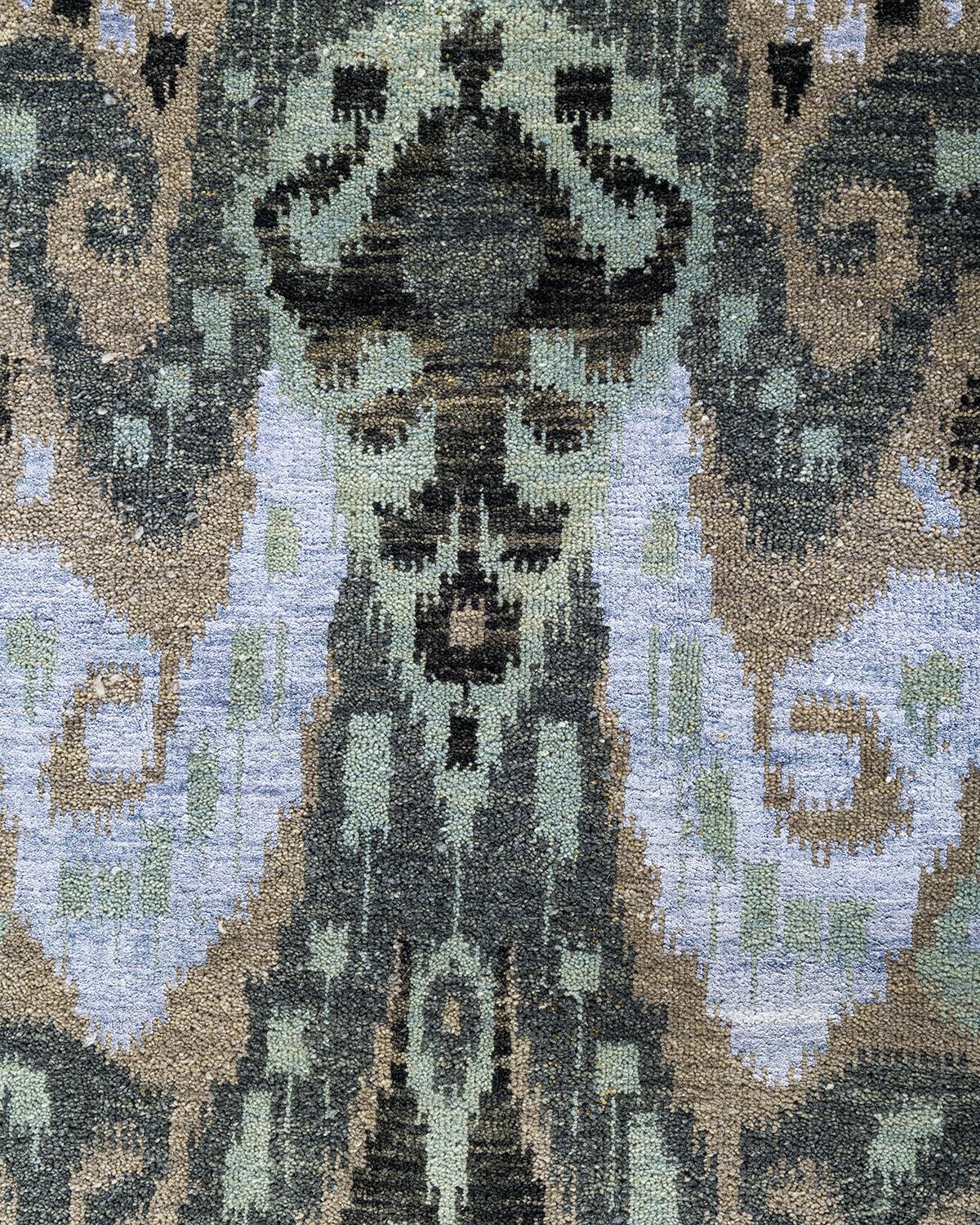 Traditioneller handgeknüpfter, geblümter Ikat-Teppich aus Seide und Wolle in Grün 9' 1