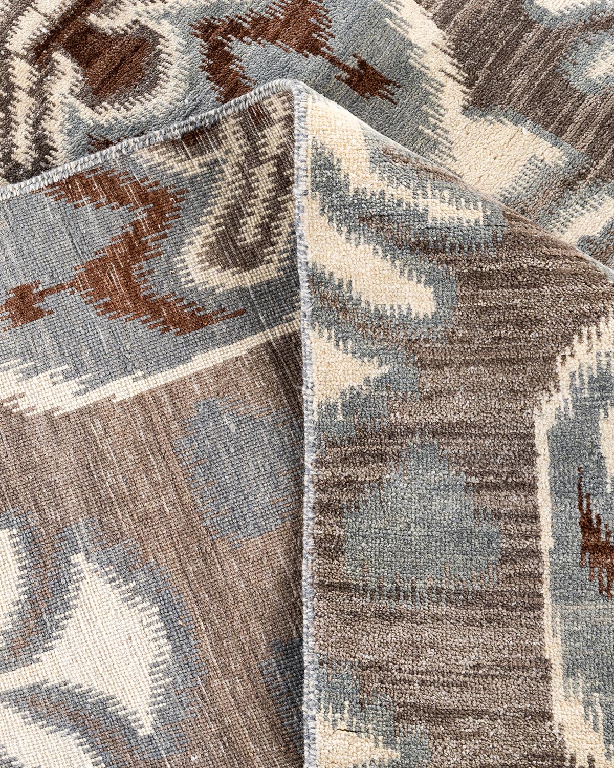 Traditioneller handgeknüpfter, grauer Ikat-Teppich aus geblümter Wolle 9' 1