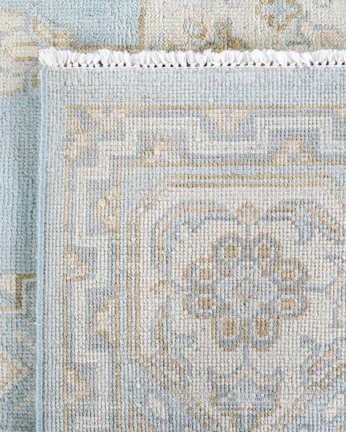 Traditioneller handgeknüpfter, geblümter Khotan-Teppich aus Wolle in Blau 9' 1