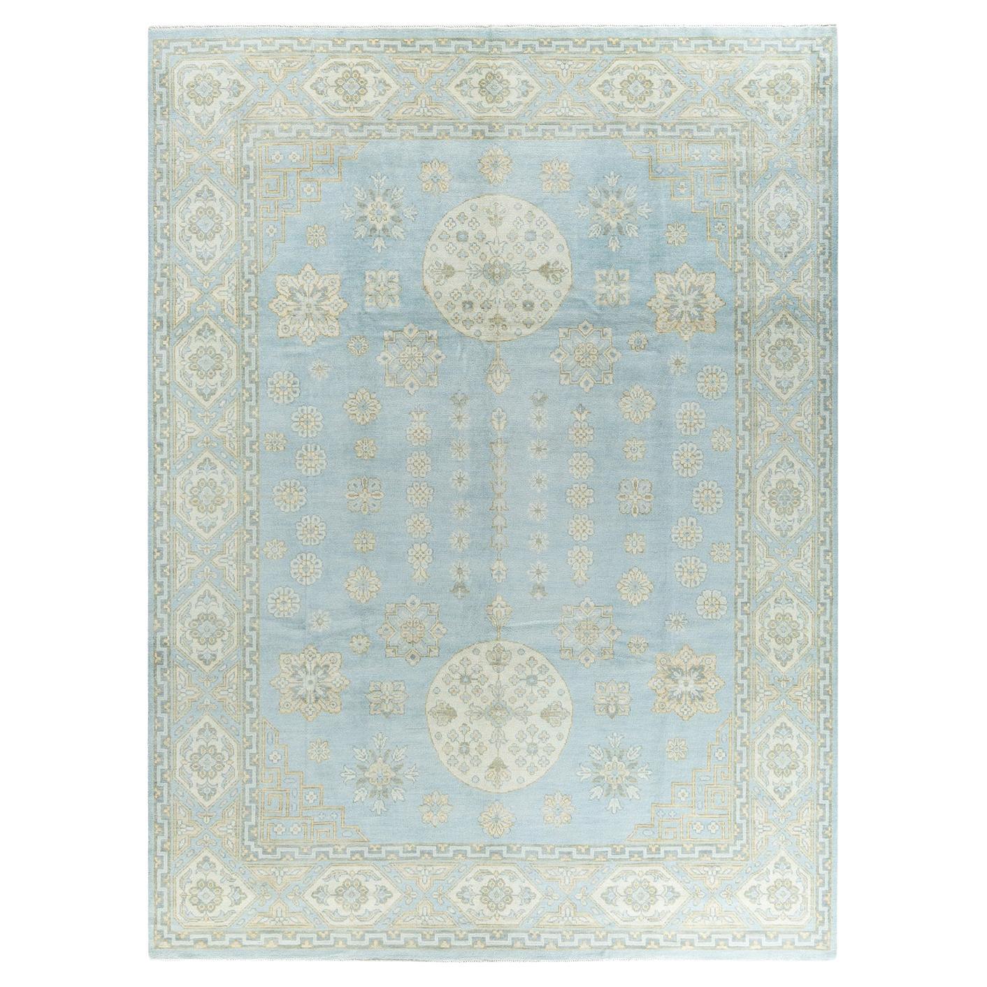 Traditioneller handgeknüpfter, geblümter Khotan-Teppich aus Wolle in Blau 9' 1" x 12' 1"