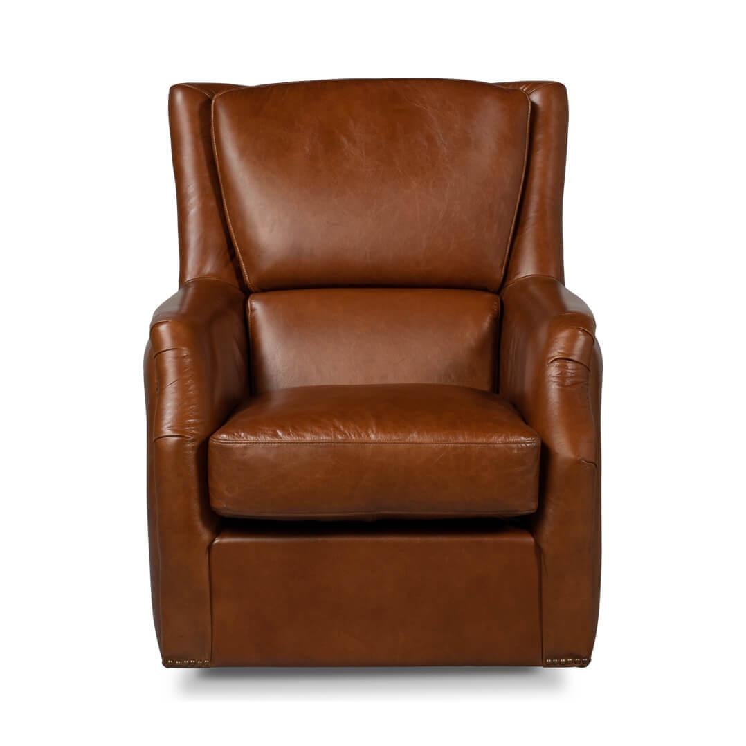 A traditional leather swivel chair accented with nailhead trim accents. This classic chair is upholstered in our vintage cigar leather and crafted with pure Aniline top-grade cow leather. 

Dimensions: 31