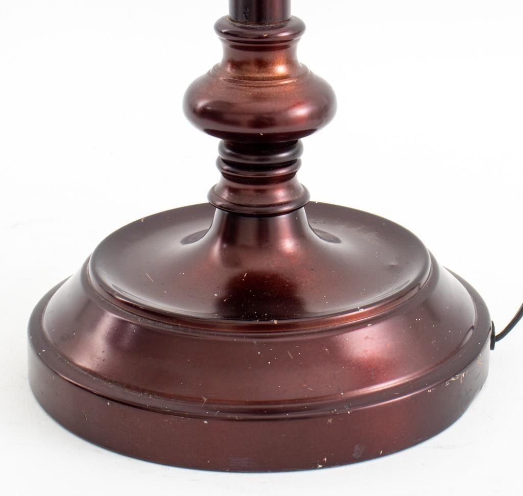 Traditional bronze-colored metal office table lamp, with an adjustable head.