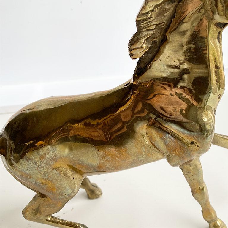 A fabulous gift for the horse lover in your life. (Or for yourself.) Add this piece to an open spot on your bookshelf to draw the eye toward all those lovely books you've been collecting. Created from solid brass, this equine animal is depicted
