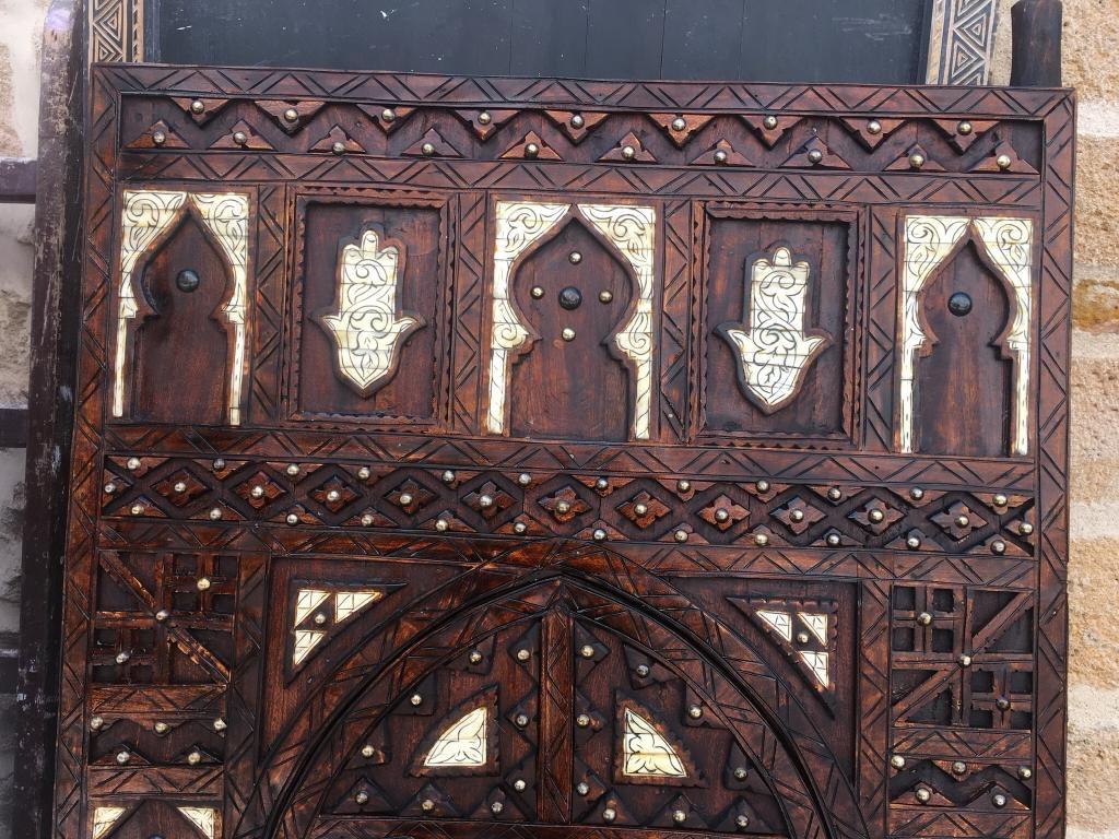 Contemporary Moroccan Double Door, Hand Carved Tamarisk, Inlaid Bone, Wrought Iron Knocker For Sale