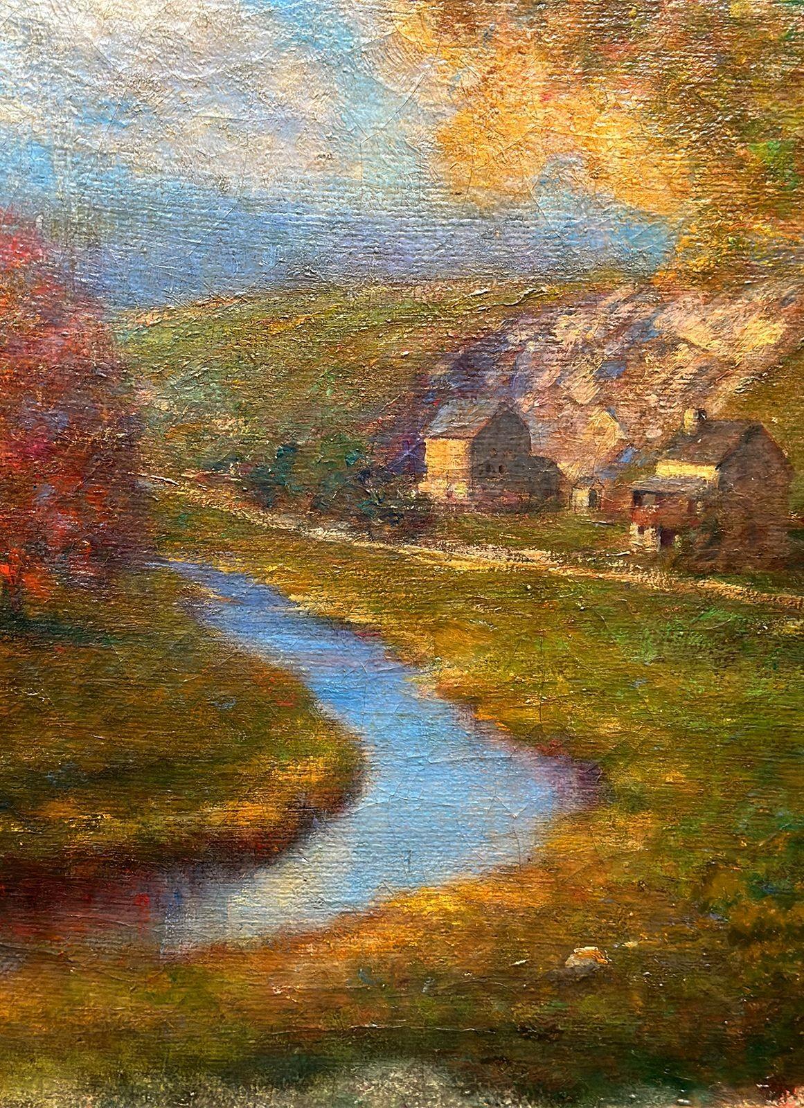 Traditional framed oil on canvas depicting a landscape with a flowing blue river and rich flora all around, and also illustrating small houses next to the lake. Signed by Joseph George Willman on the lower right.
26.5