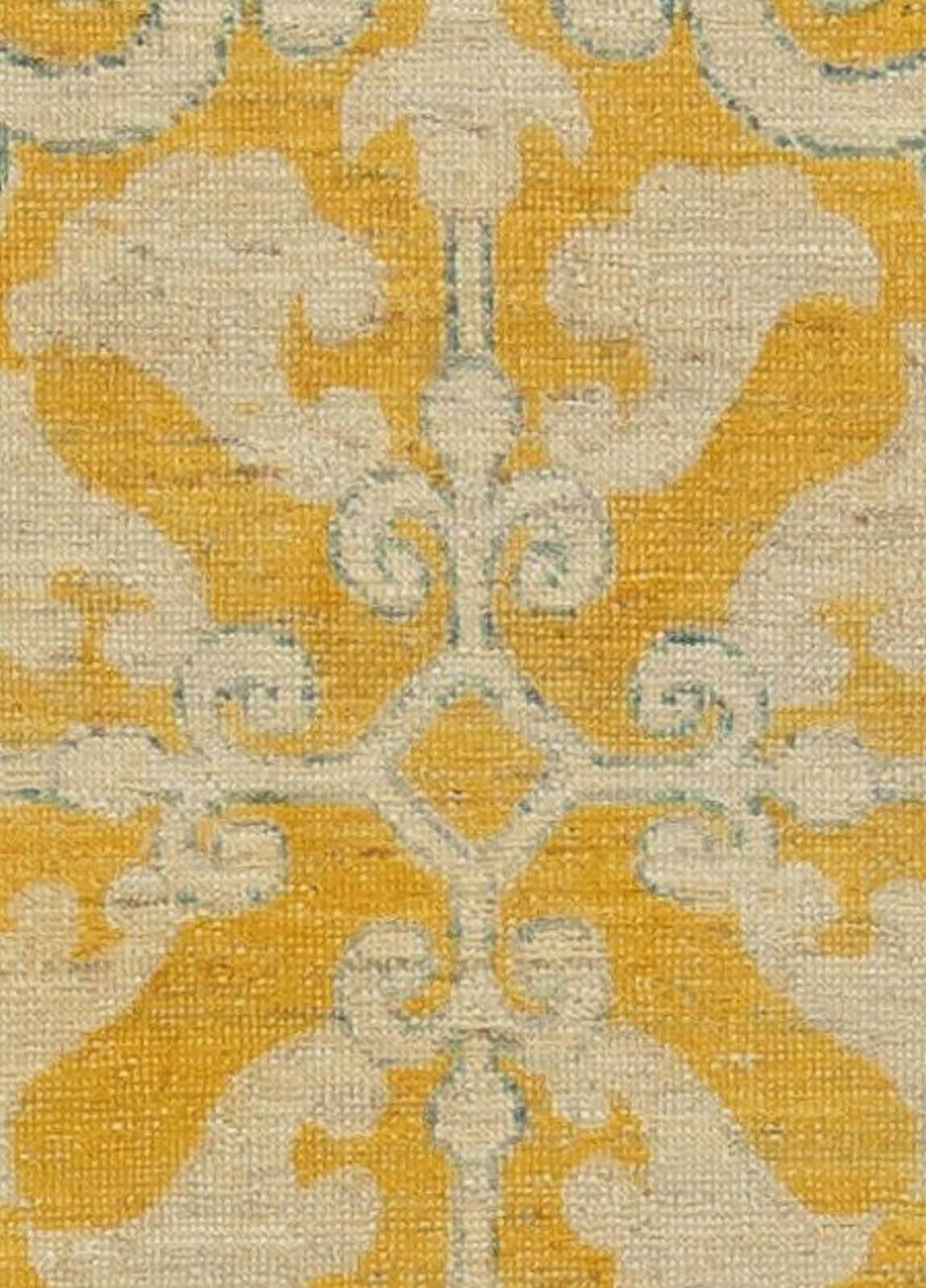 Traditional oriental inspired yellow handmade wool rug by Doris Leslie Blau.
Size: 2'10