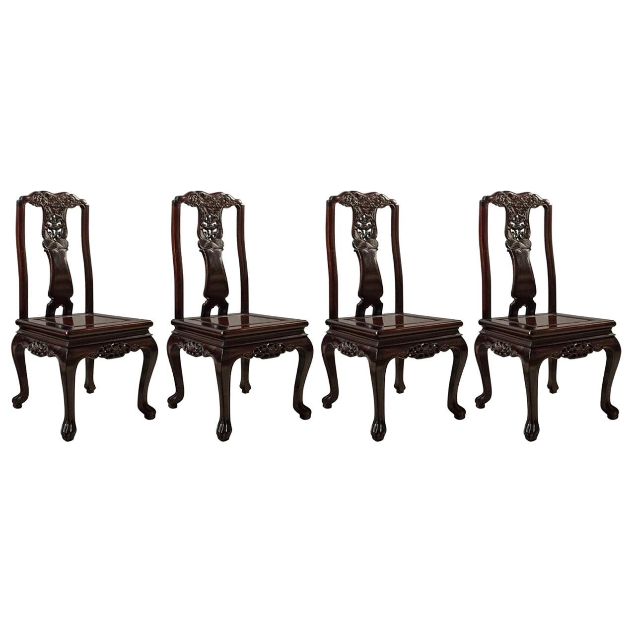 Ensemble traditionnel de quatre chaises de salle à manger en palissandre oriental:: fin du 20e siècle