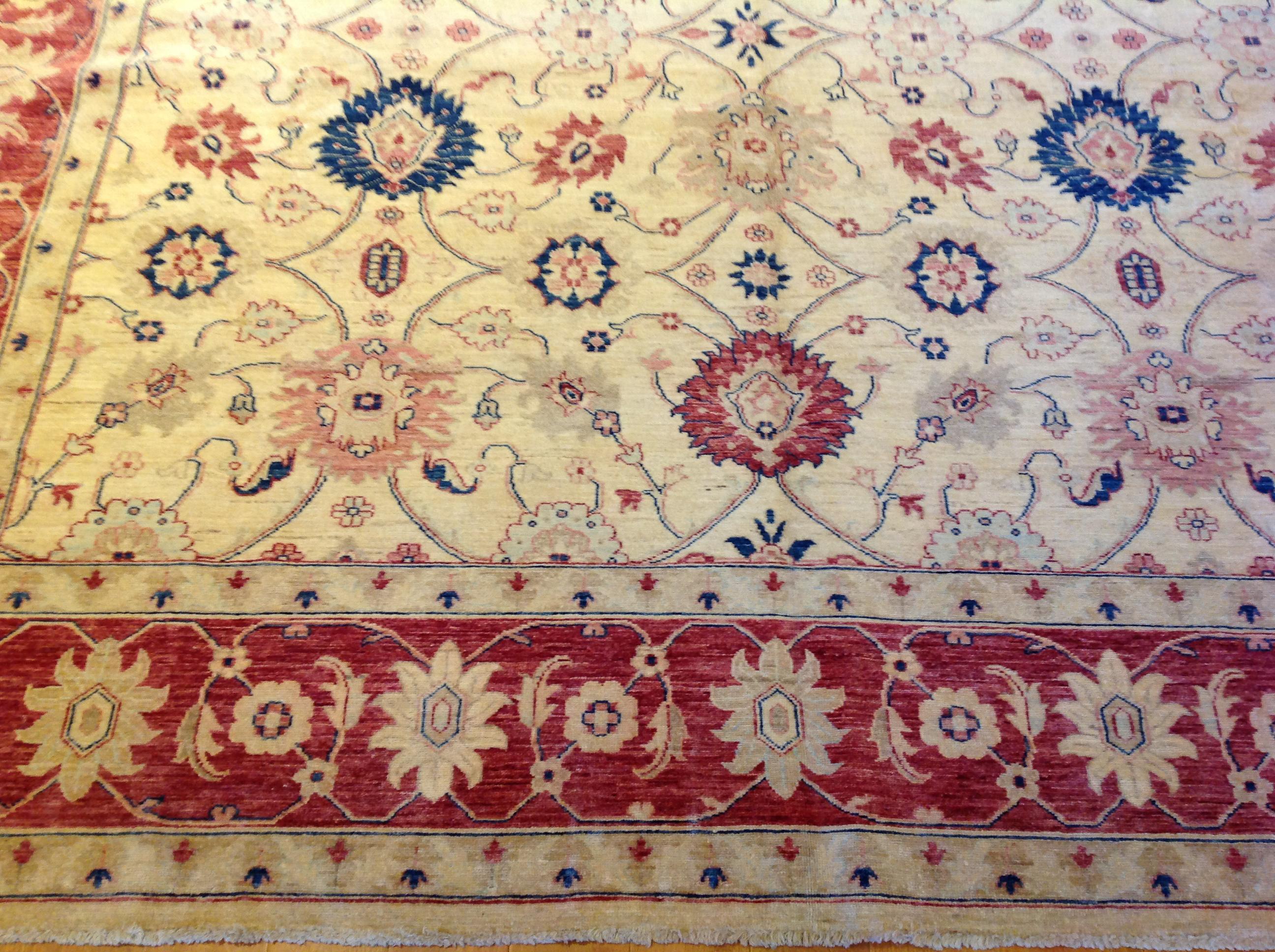 Hand-Knotted Traditional Pakistani Beige Floral Rug with Red and Teal For Sale