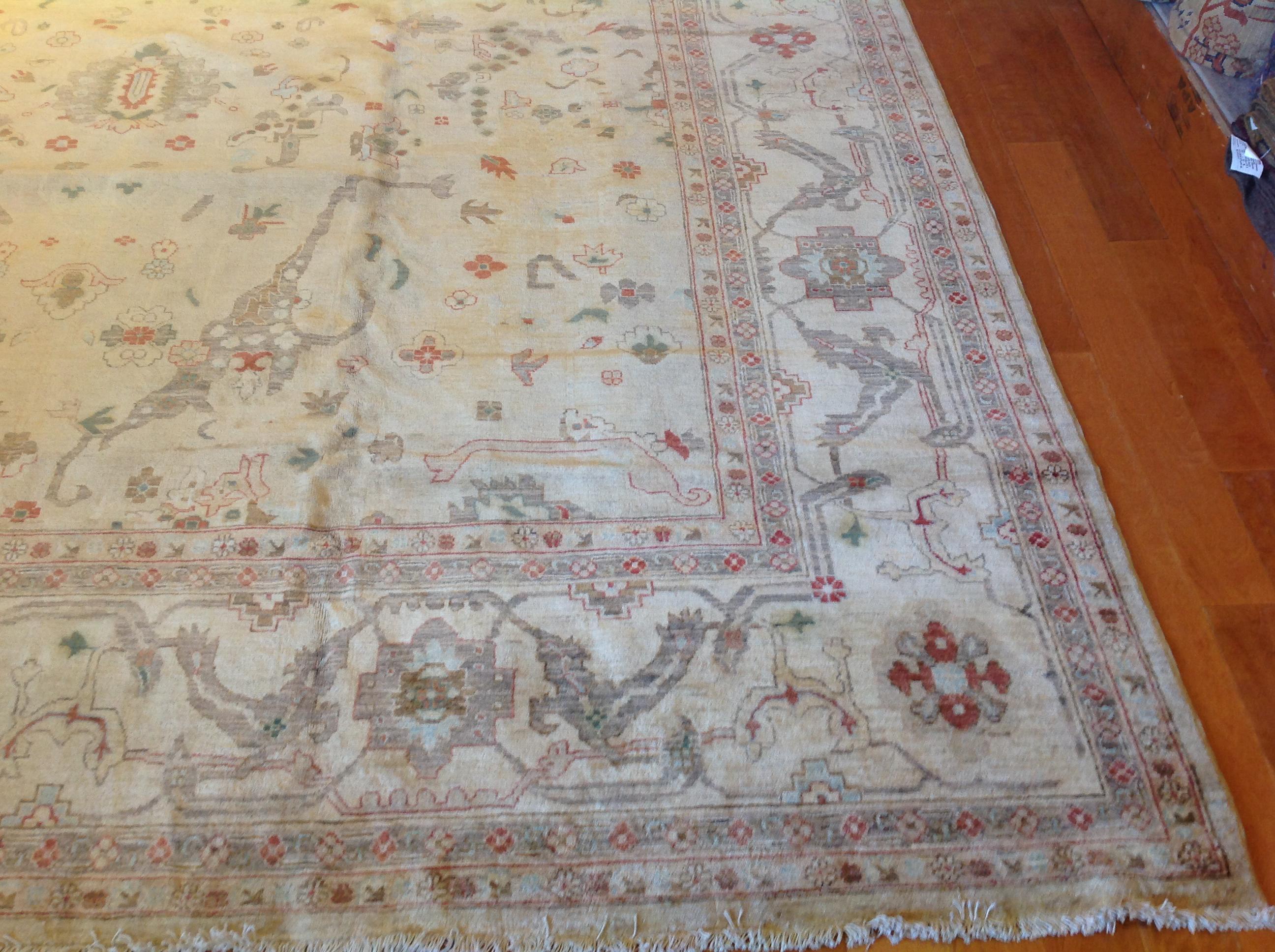 Contemporary Traditional Pakistani Beige Wool Area Rug with Floral Motif For Sale