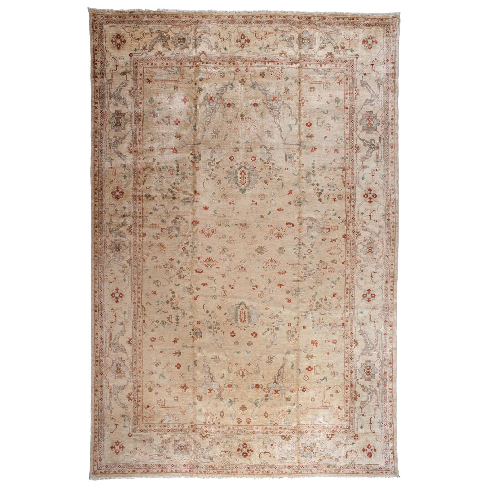 Traditional Pakistani Beige Wool Area Rug with Floral Motif For Sale