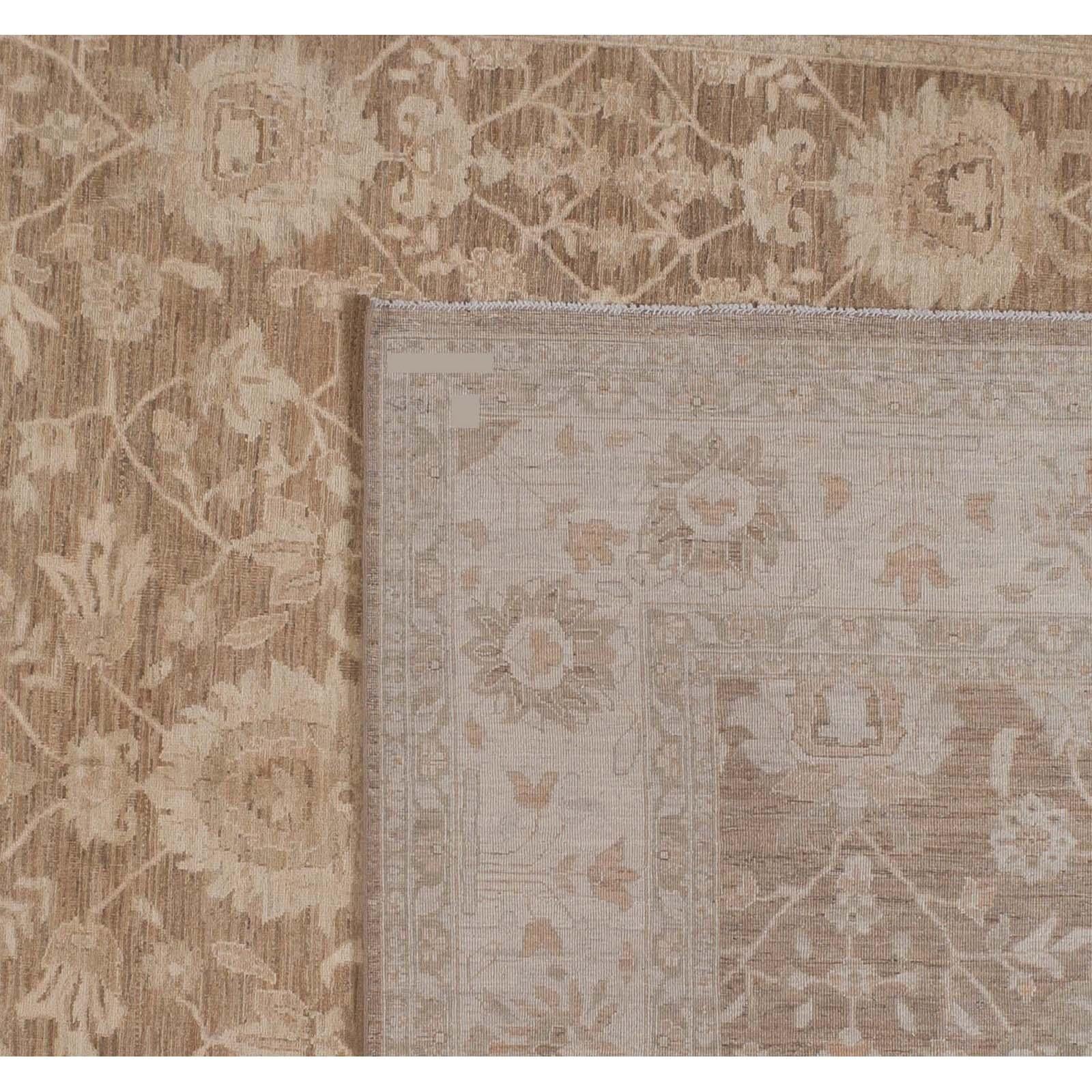 An excellent example of a traditional Pakistani design executed in a range of warm brown and beige tones that will bring warmth and energy to any space. The darker centre panel features floral medallions in pleasing symmetrical pattern. The