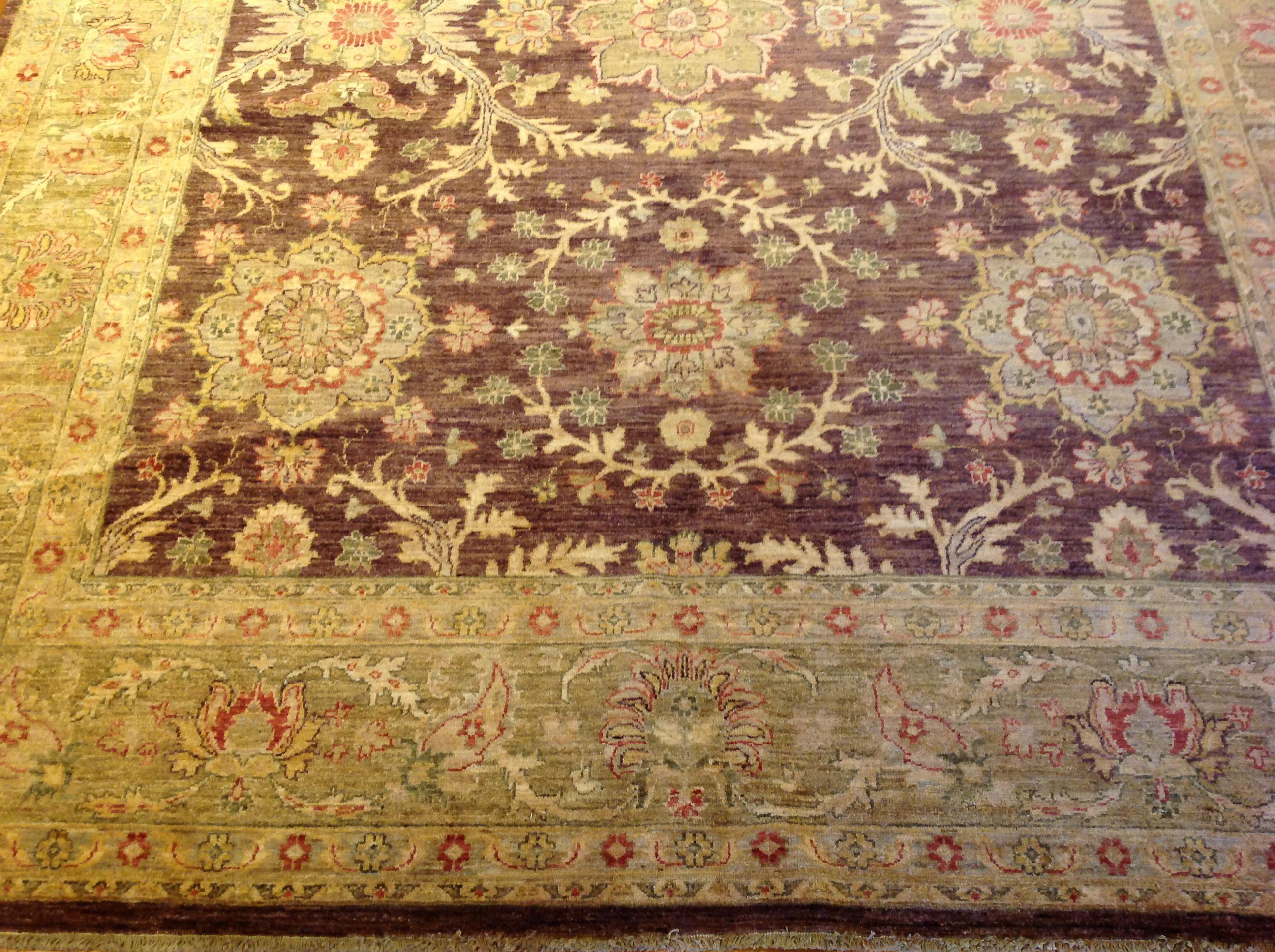 Hand-Knotted Traditional Pakistani Design with Floral Medallions and Vines For Sale