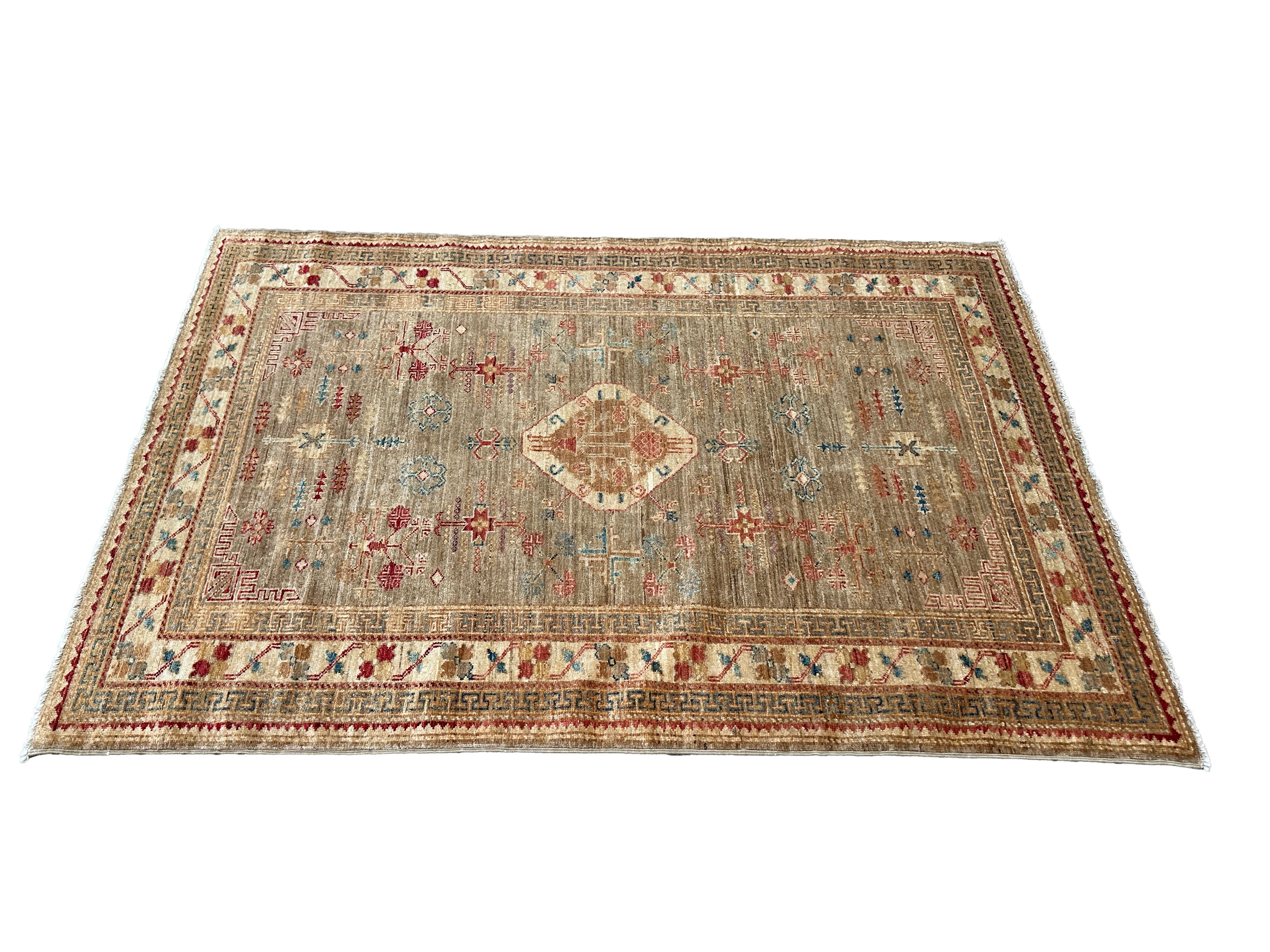 Alfombra tradicional paquistaní de lana - 4x6 Naranjas, azules y cremas vibrantes Pakistaní en venta