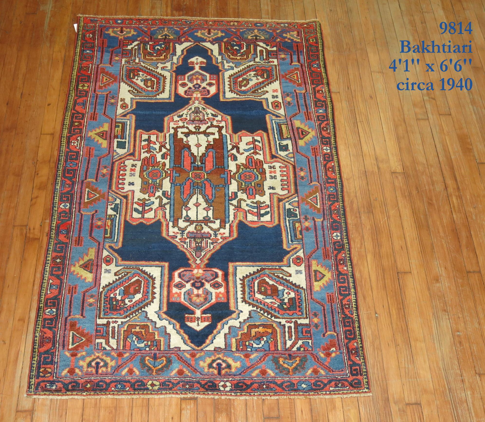 A traditional colorful Persian Bakhtiari rug,

circa 1940. Measures: 4'1