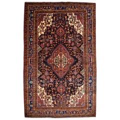 Traditional Persian Nahavand Carpet in Red, Black and Cream Wool