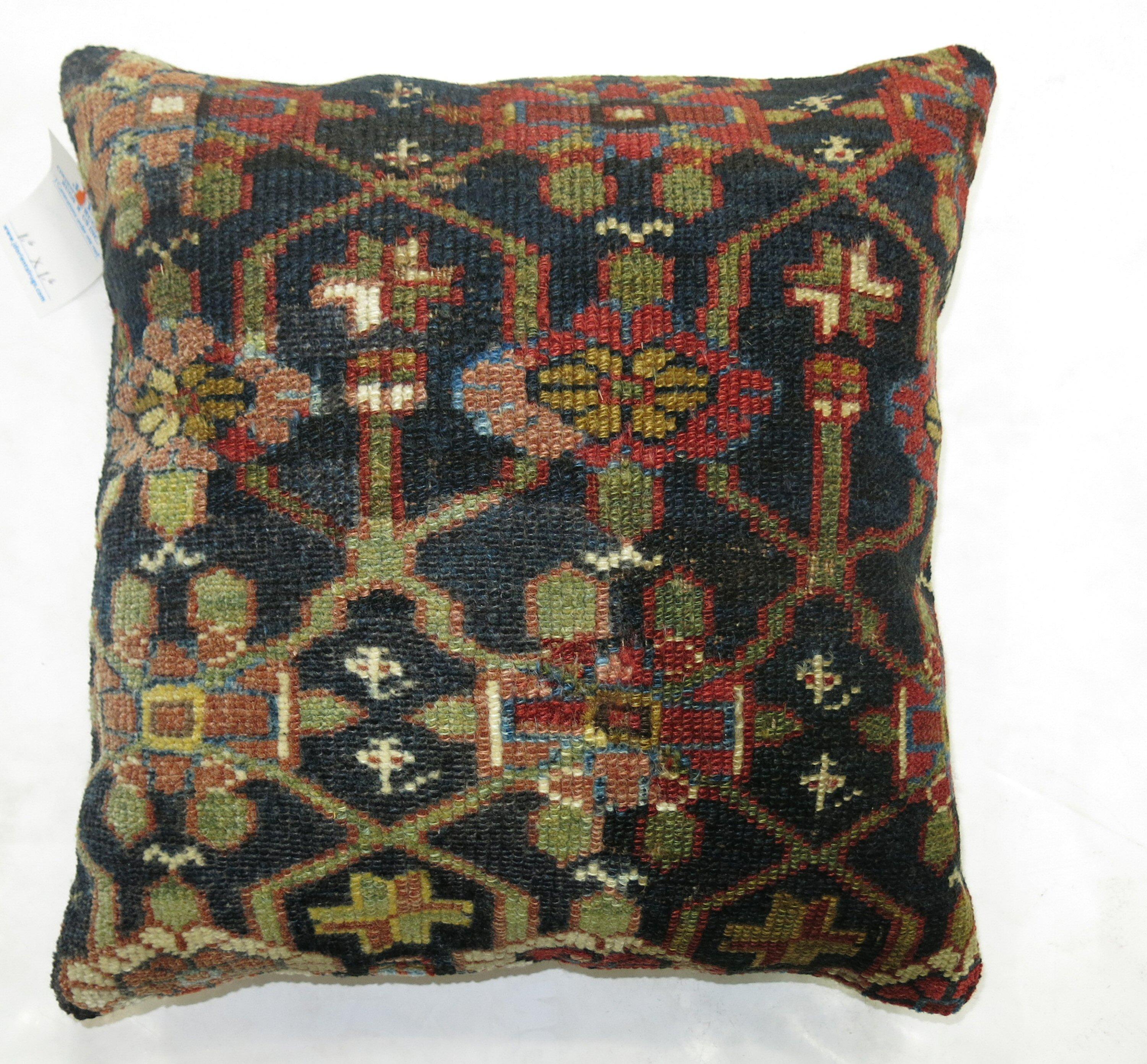 Pillow made from an early 20th century Persian Mahal rug. 

18'' x 18''.