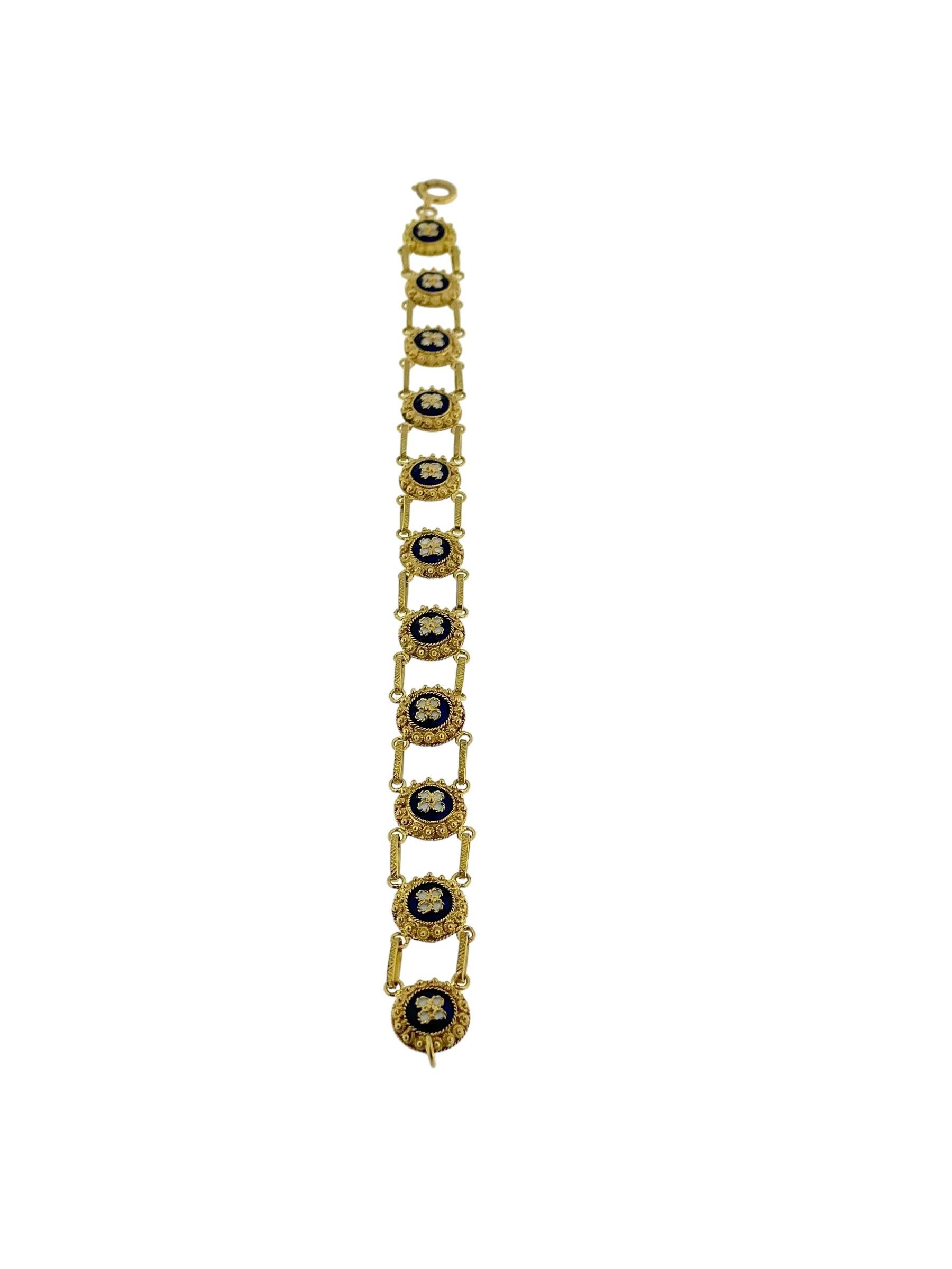 This Traditional Portuguese Bracelet is a magnificent example of classic Portuguese jewelry craftsmanship, combining rich materials and intricate design techniques. Made from 19kt yellow gold, the bracelet showcases the luxurious and warm tone of