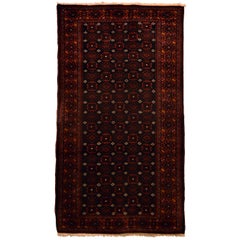 Alfombra tradicional persa Balouchi de lana de los años 40, 4' x 6