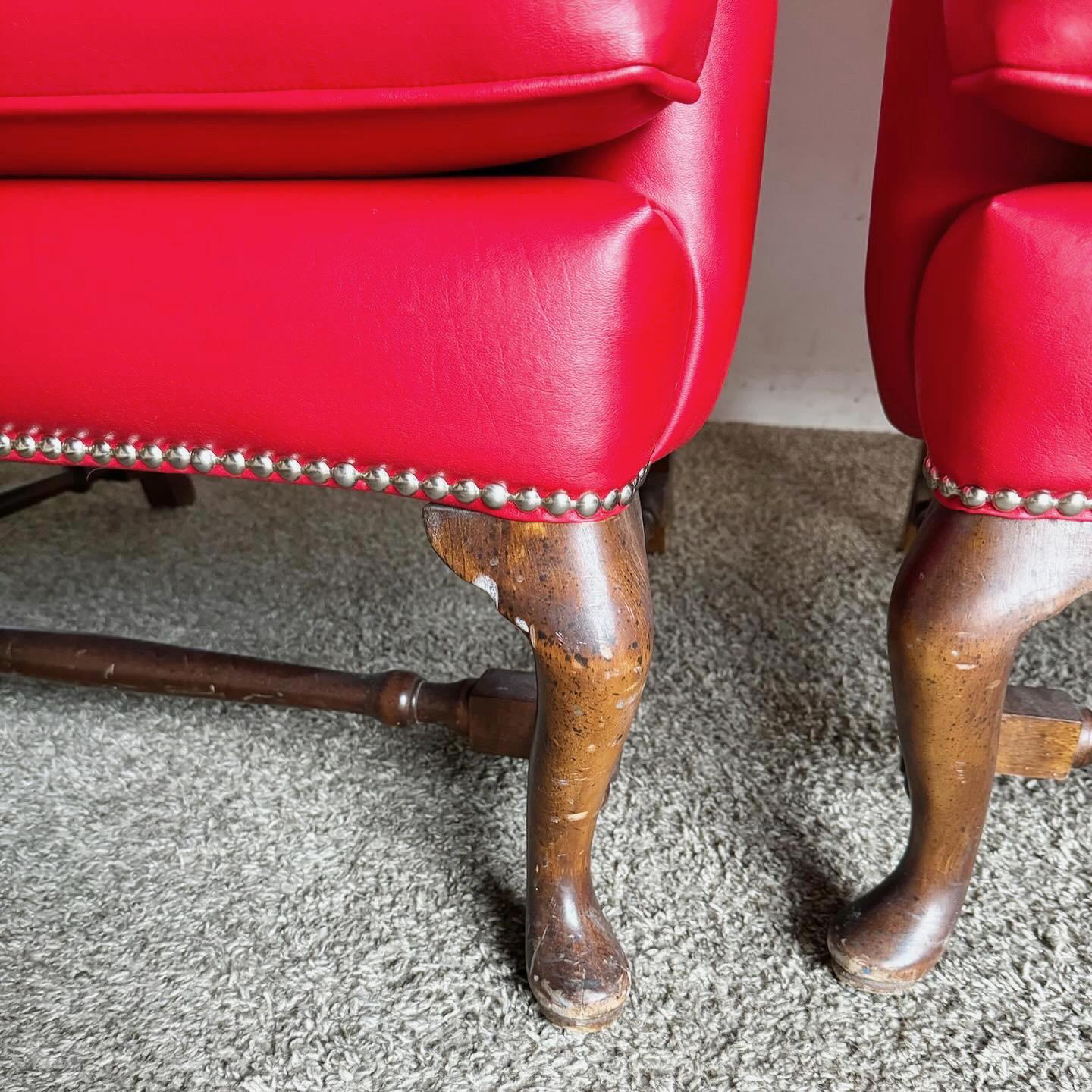 20th Century Traditional Red Faux Leather Wingback Chairs - a Pair For Sale