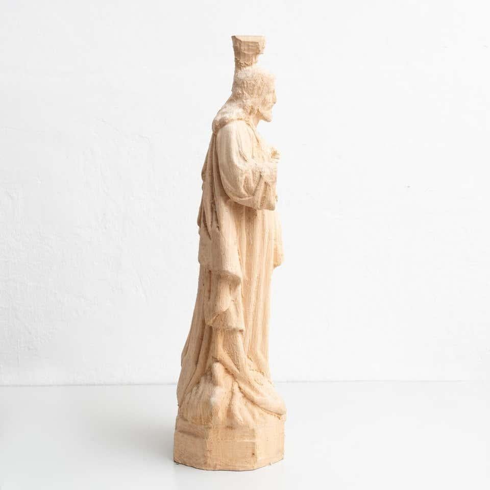 Mid-20th century turned Jesus Christ figure of made of wood.  Made in Olot, Spain.    In original condition, with minor wear consistent with age and use, preserving a beautiful patina.    Materials:  Wood.