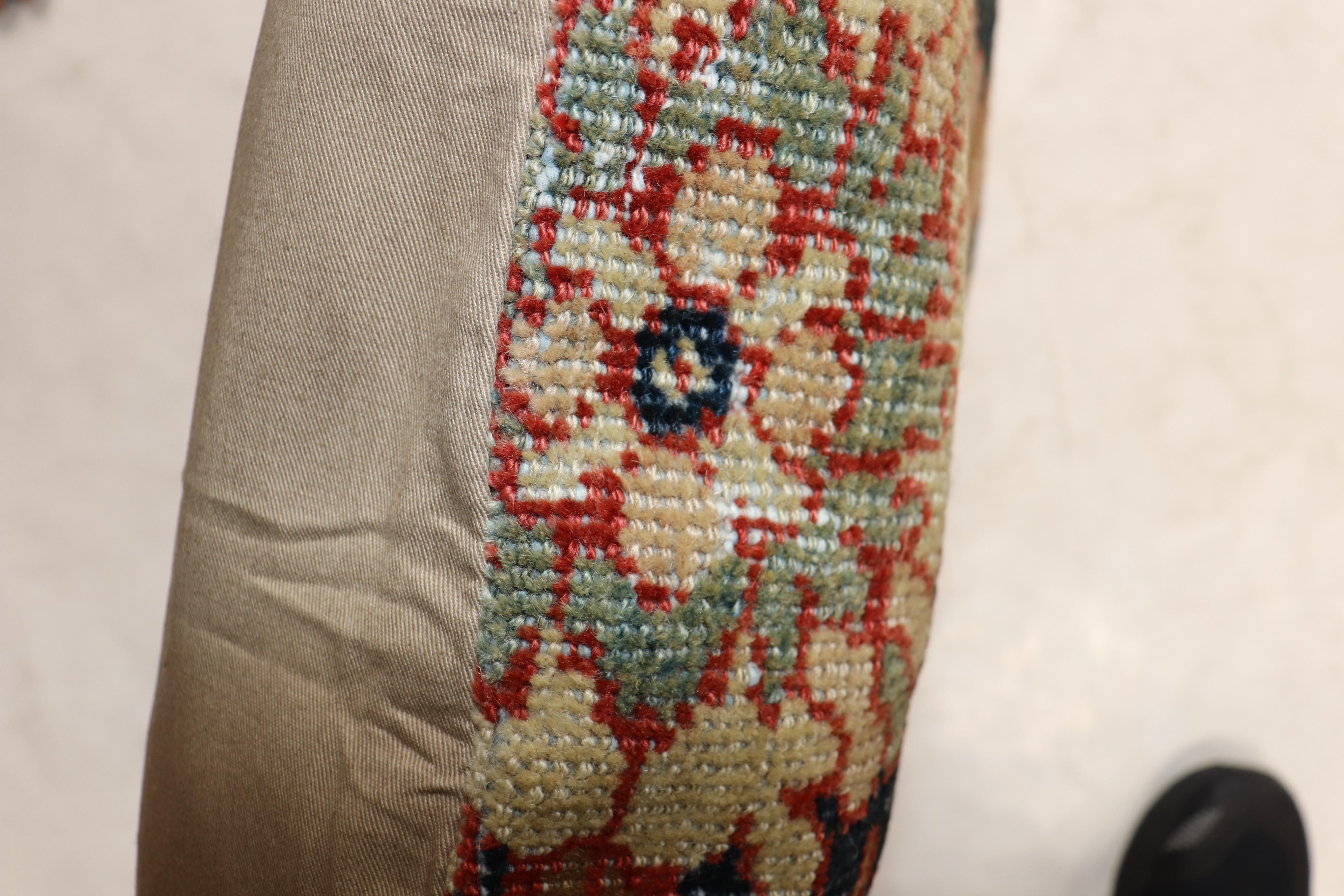 Pillow made from an antique Persian Mahal rug with a cotton back and zipper closure included.

Measures: 24” x 24”.