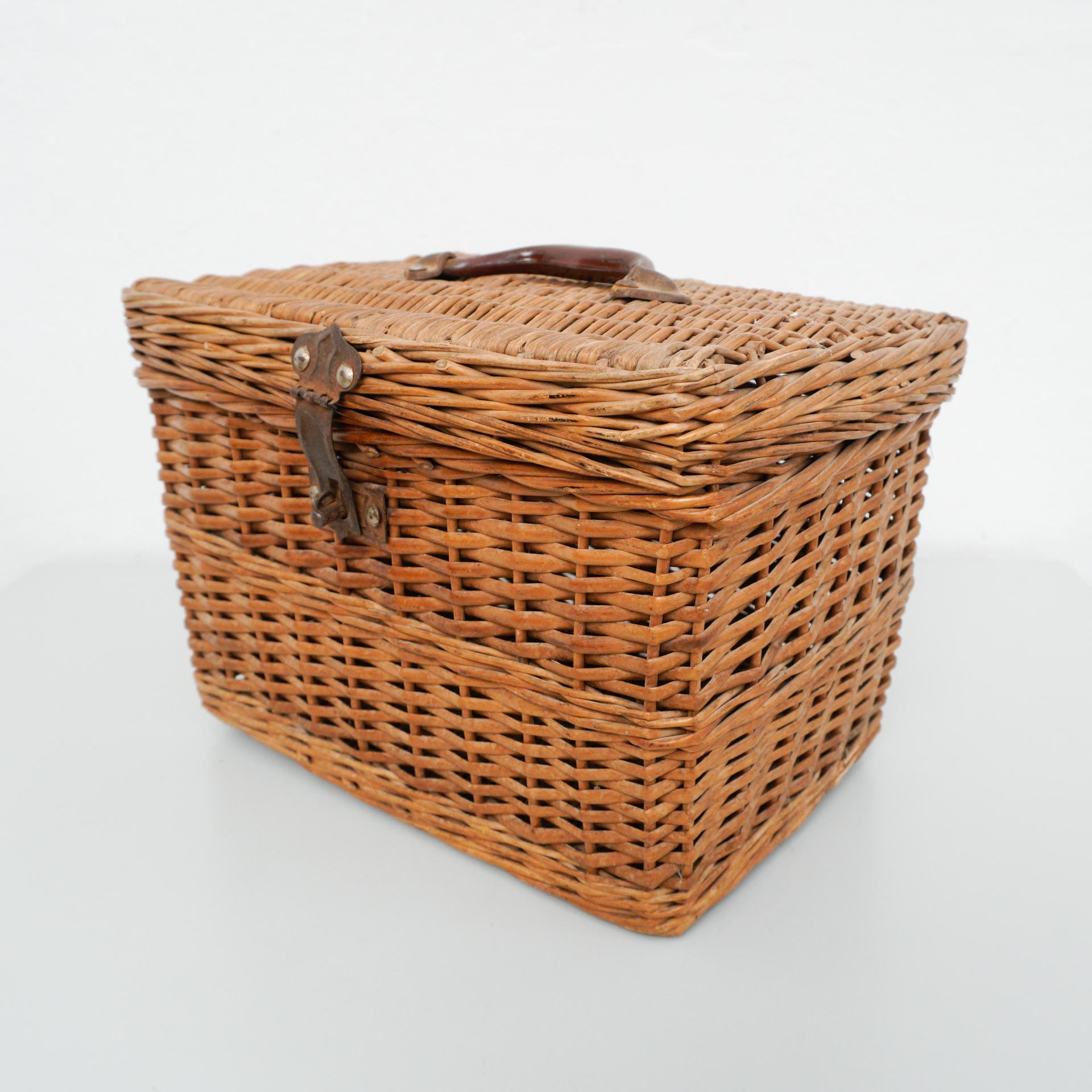 Traditional rustic rattan basket, circa 1950
By unknown Manufacturer. France

In original condition with minor wear consistent of age and use, preserving a beautiful patina.