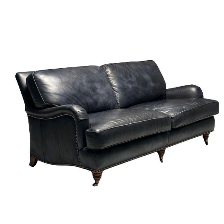 Georgian Rolled Scroll Arm Library Blue Leather Sofa, Sette, George Smith Style

Large english traditional style library sofa in a plush very deep blue leather. sitting on five legs in total, the front three are turned and on brass caters while the