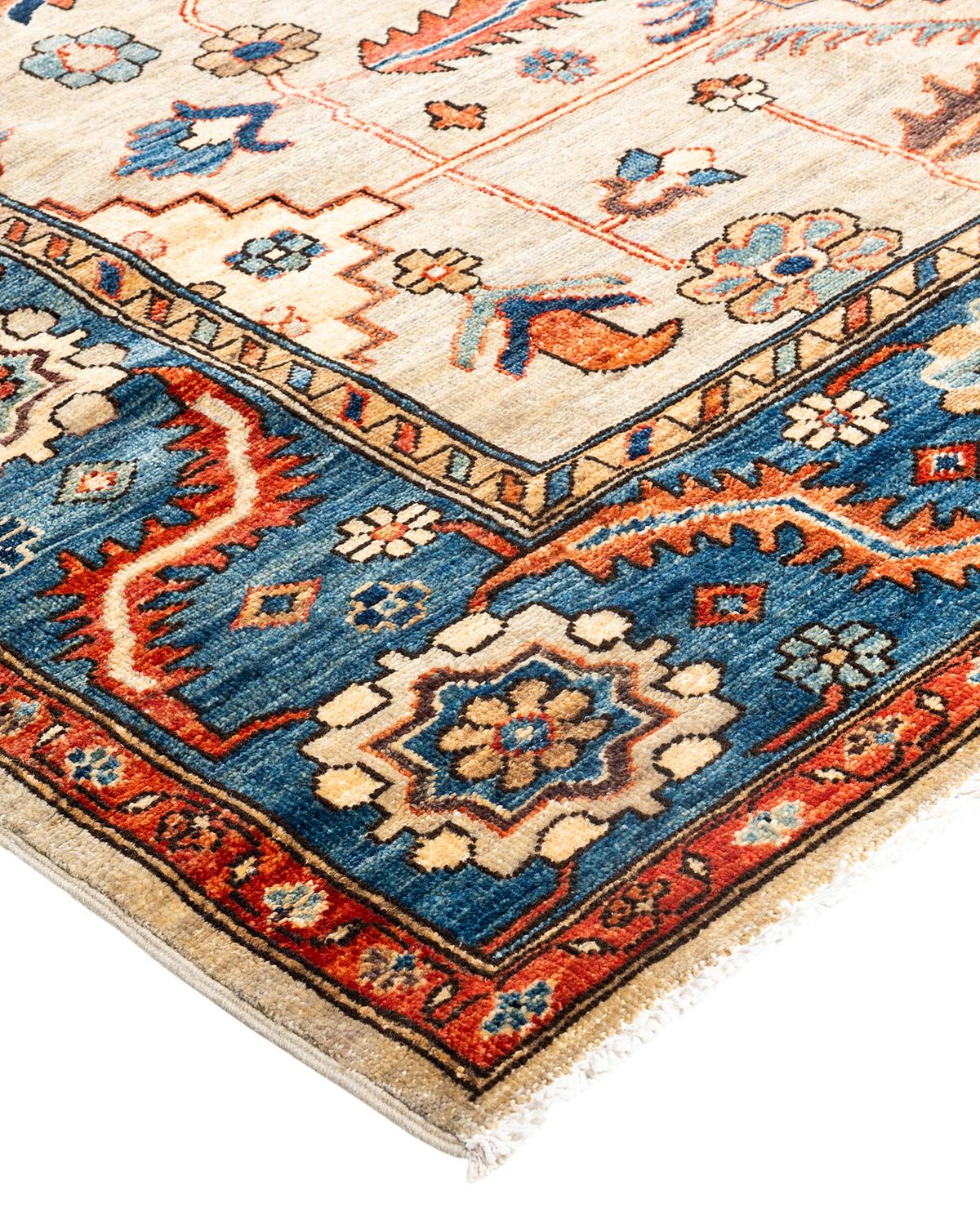 Persian rug-making at its finest inspired the rich colors, elaborate geometric motifs, and botanical detailing of the Serapi collection. With as many as 100 knots per inch, these handcrafted rugs are as durable as they are visually stunning, and