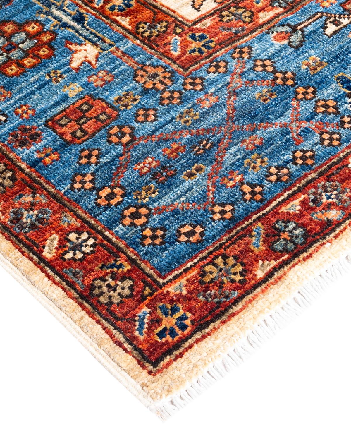 Persian rug-making at its finest inspired the rich colors, elaborate geometric motifs, and botanical detailing of the Serapi collection. With as many as 100 knots per inch, these handcrafted rugs are as durable as they are visually stunning, and