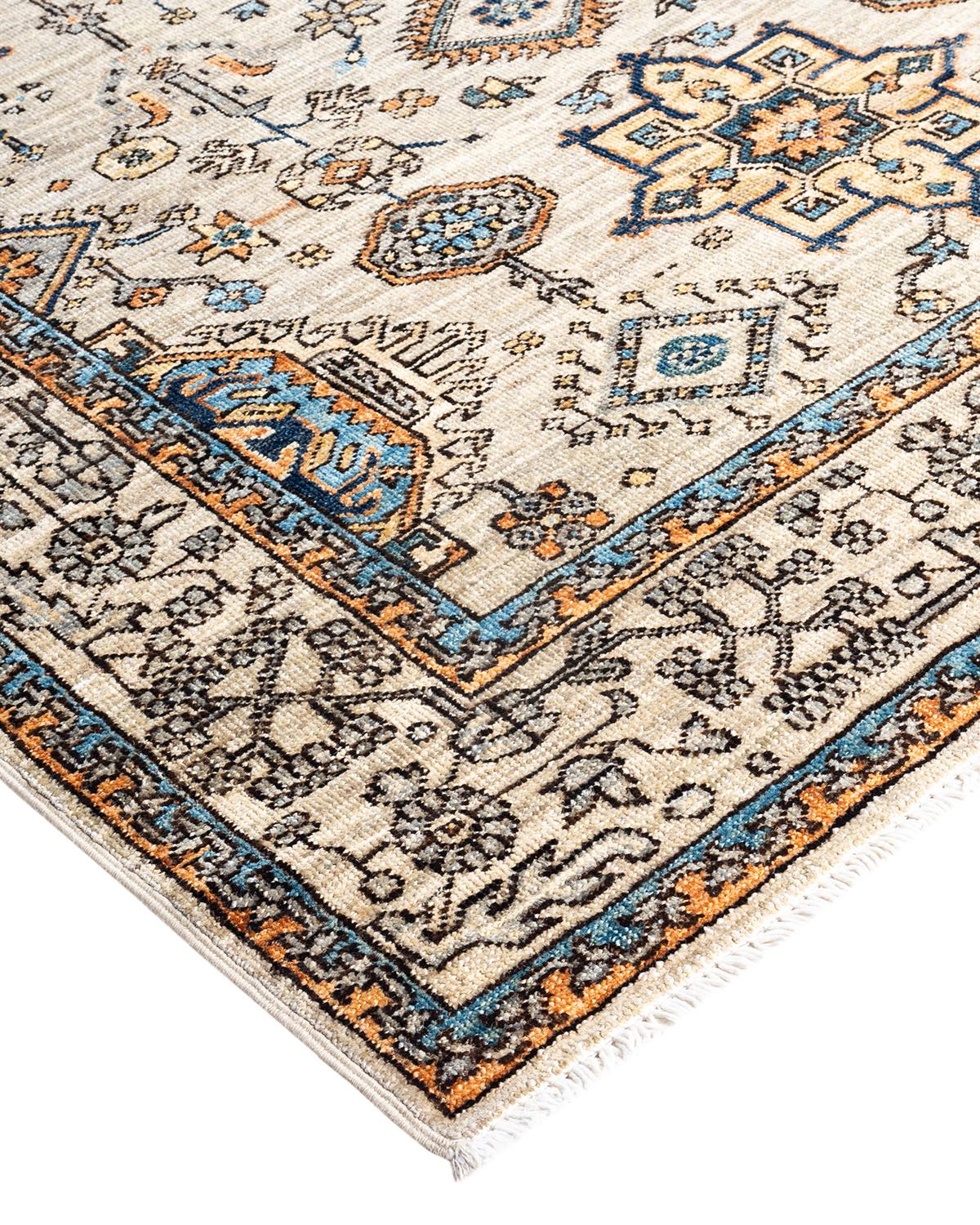 Persian rug-making at its finest inspired the rich colors, elaborate geometric motifs, and botanical detailing of the Serapi collection. With as many as 100 knots per inch, these handcrafted rugs are as durable as they are visually stunning, and