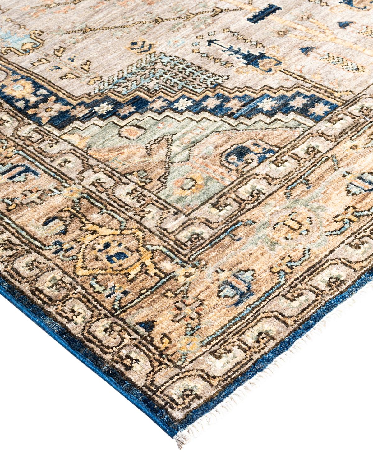 Persian rug-making at its finest inspired the rich colors, elaborate geometric motifs, and botanical detailing of the Serapi collection. With as many as 100 knots per inch, these handcrafted rugs are as durable as they are visually stunning, and