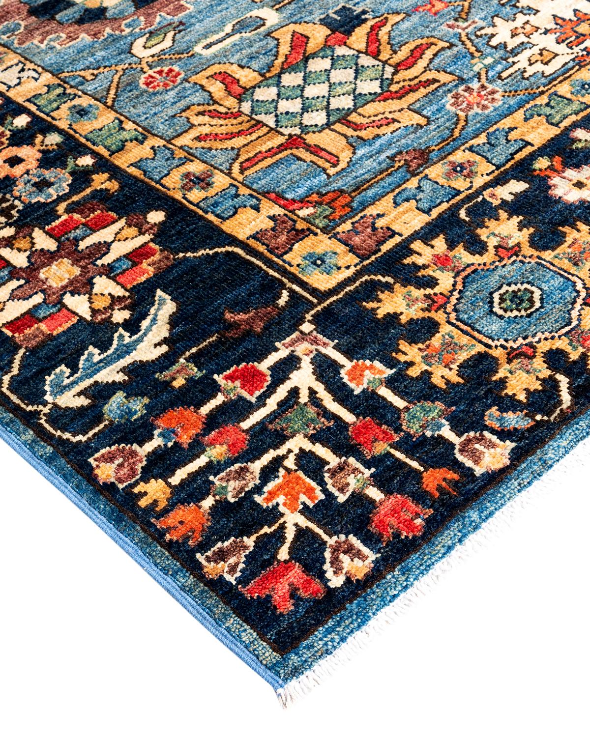 Persian rug-making at its finest inspired the rich colors, elaborate geometric motifs, and botanical detailing of the Serapi collection. With as many as 100 knots per inch, these handcrafted rugs are as durable as they are visually stunning, and
