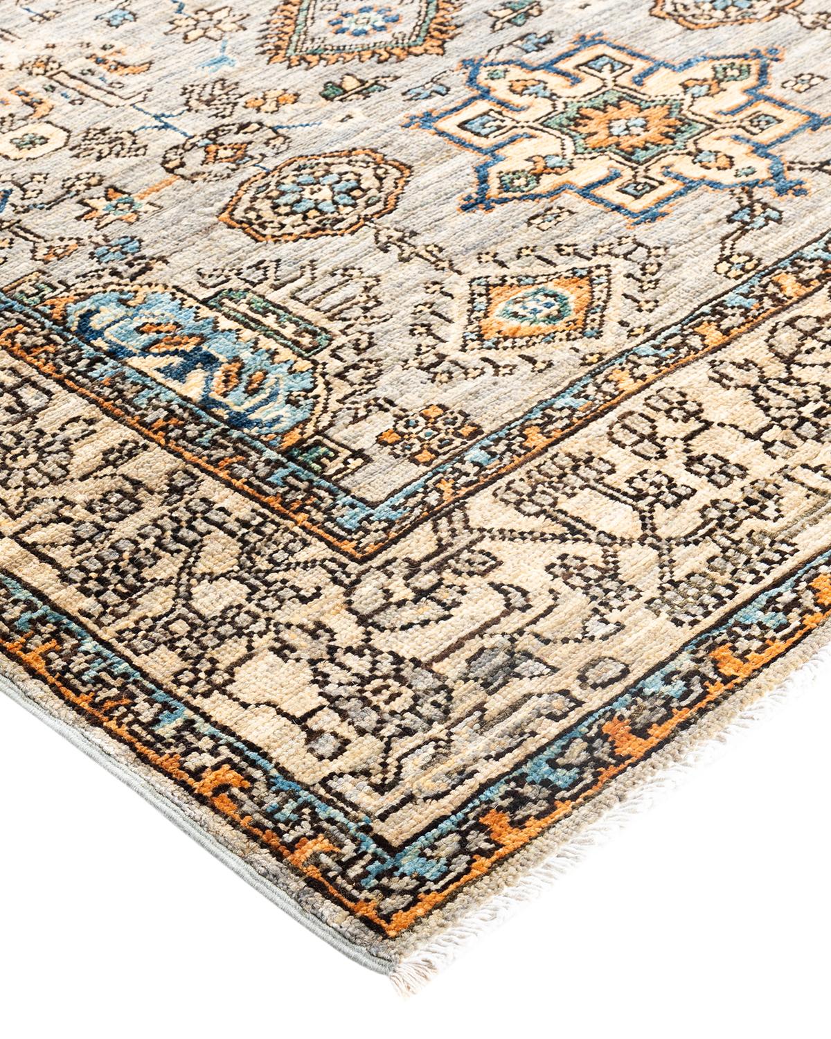 Persian rug-making at its finest inspired the rich colors, elaborate geometric motifs, and botanical detailing of the Serapi collection. With as many as 100 knots per inch, these handcrafted rugs are as durable as they are visually stunning, and