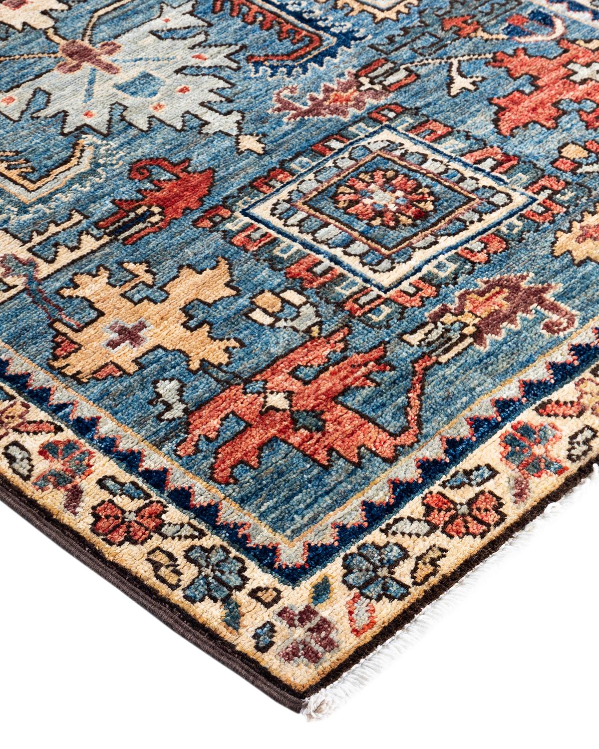 Persian rug-making at its finest inspired the rich colors, elaborate geometric motifs, and botanical detailing of the Serapi collection. With as many as 100 knots per inch, these handcrafted rugs are as durable as they are visually stunning, and