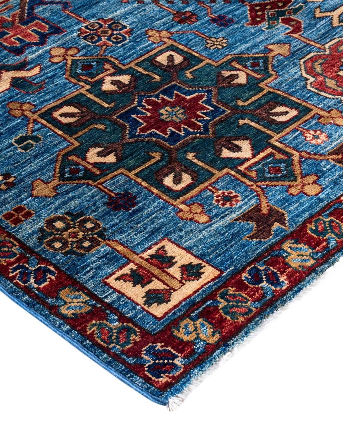 Persian rug-making at its finest inspired the rich colors, elaborate geometric motifs, and botanical detailing of the Serapi collection. With as many as 100 knots per inch, these handcrafted rugs are as durable as they are visually stunning, and