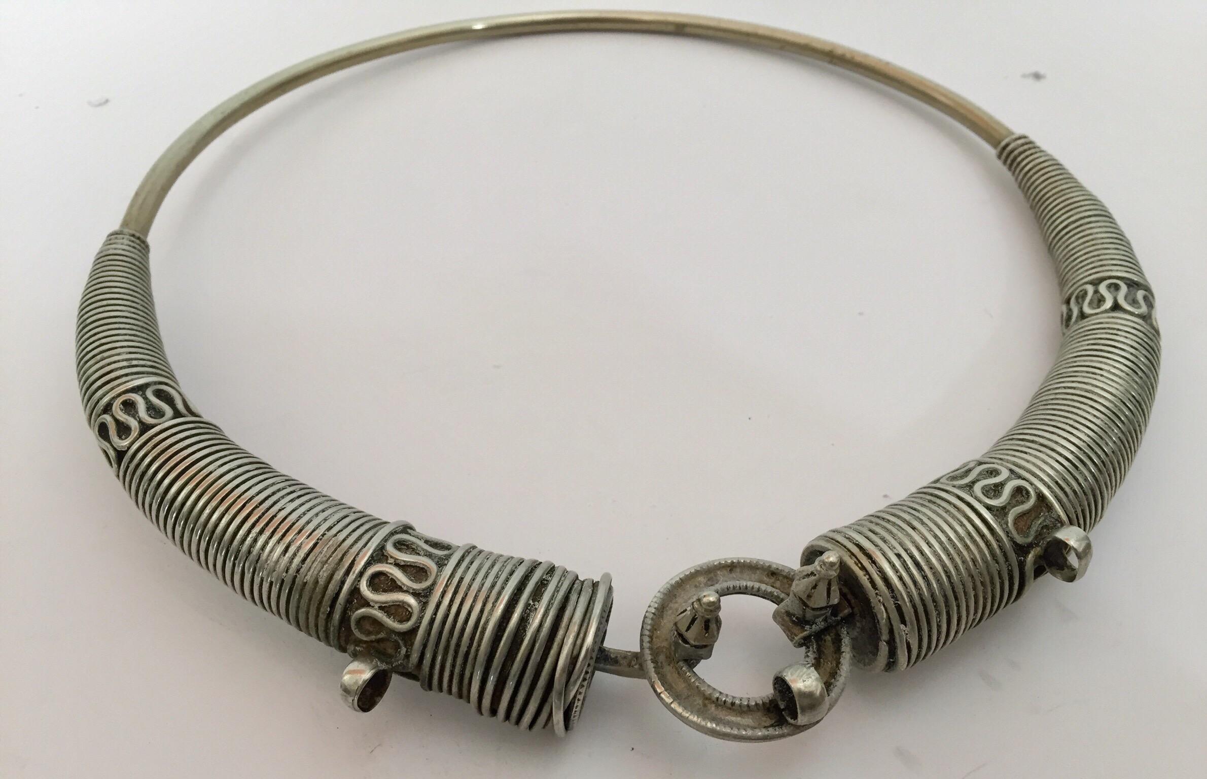 Traditional torque or Hansuli silvered necklace choker from Lambadi or Banjara and Sugali People, Andhra Pradesh, India.t India, circa 1950.
Fabulous vintage heavy spiral silvered plated choker necklace in wonderful vintage condition.
Silver, but