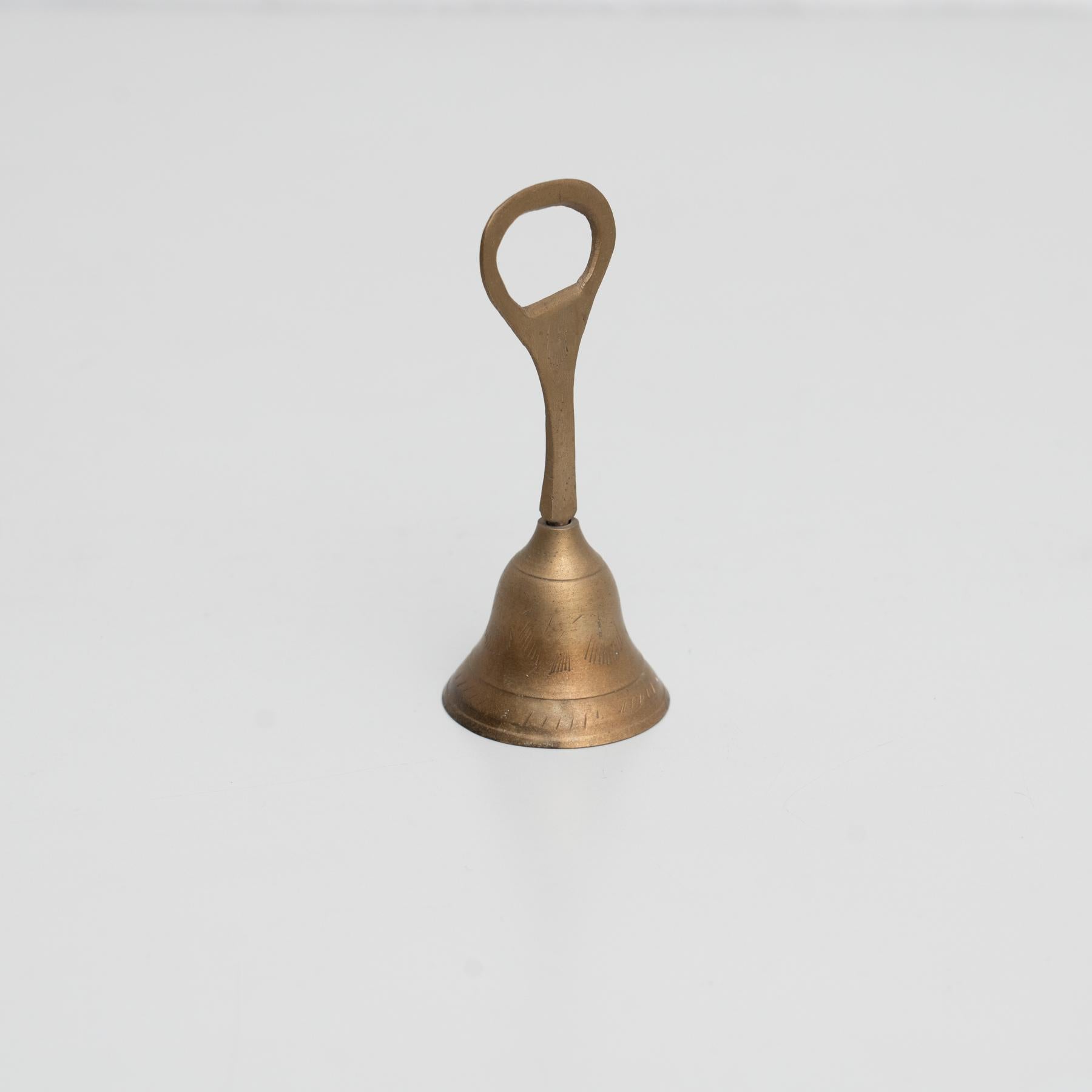 European Traditional Spanish Rustic Bronze Hand Bell Bottle Opener, circa 1950 For Sale