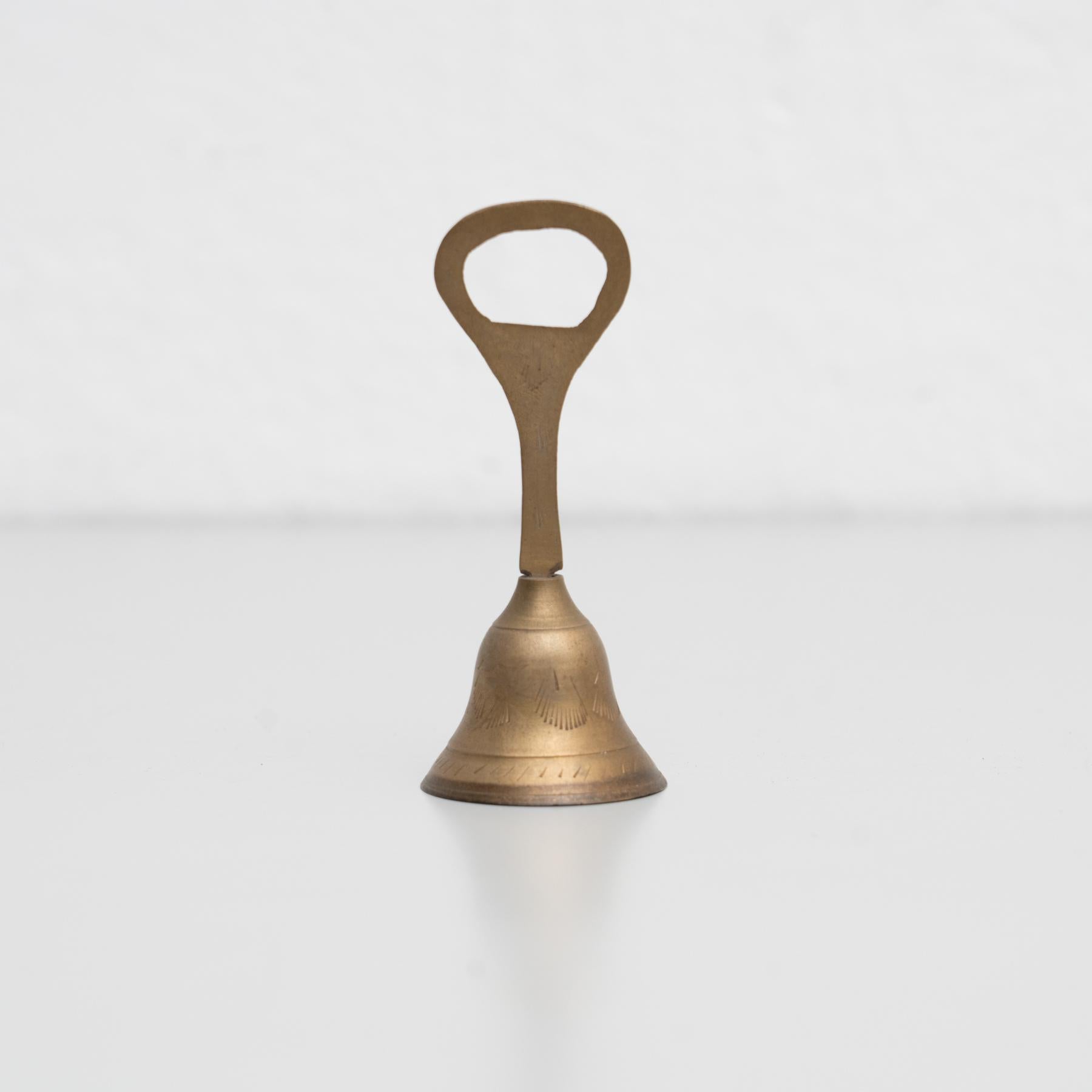 Metal Traditional Spanish Rustic Bronze Hand Bell Bottle Opener, circa 1950 For Sale