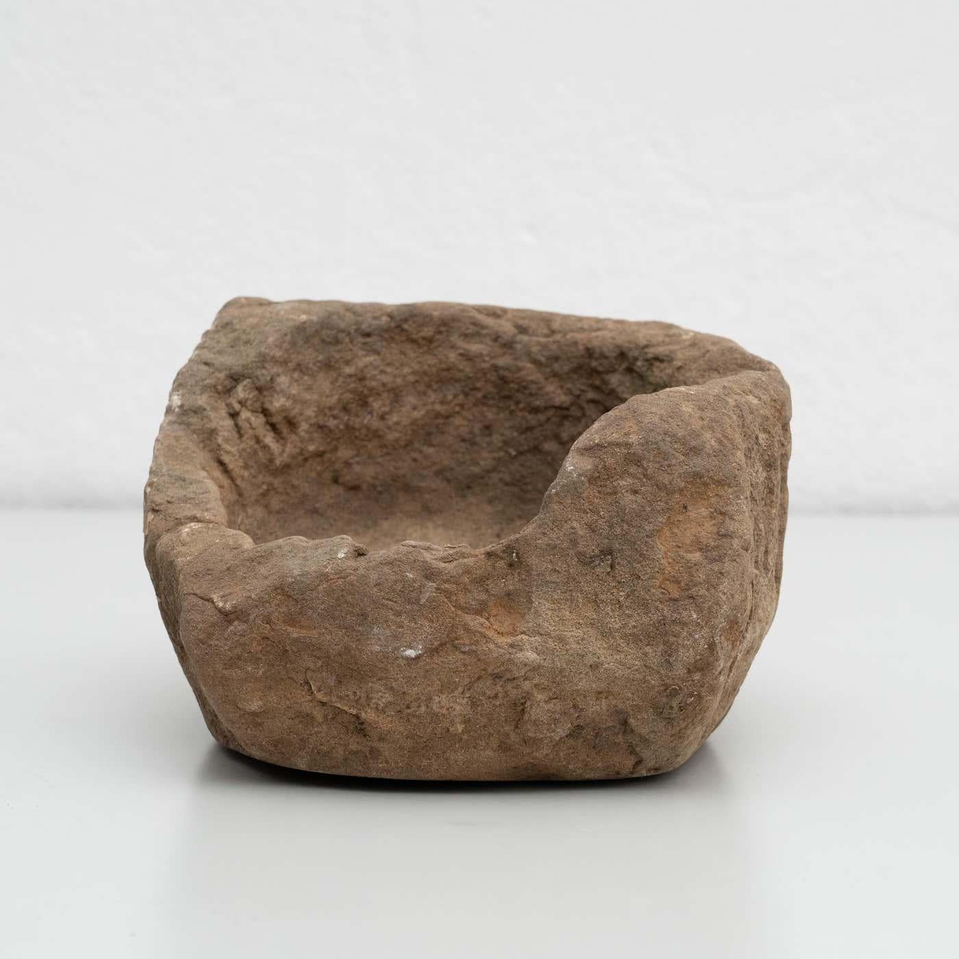 Antique vintage stone mortar. 

Made by unknown manufacturer in Spain circa 1950.

In original condition, with minor wear consistent with age and use, preserving a beautiful patina.

Materials:
Stone.
 