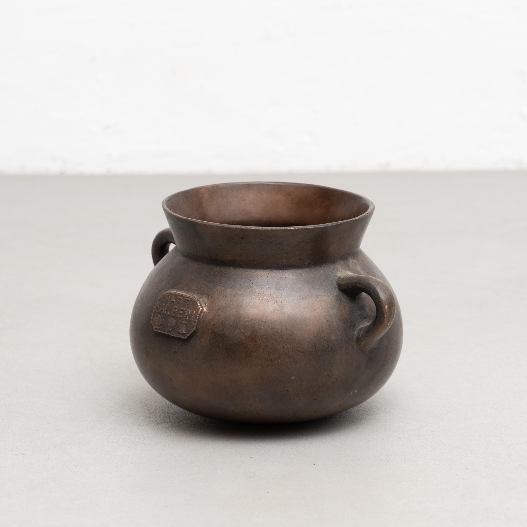Rare Vintage bronze pot. 

Marked.

By Barberí foundry in Olot, Spain circa 1950.

In original condition, with minor wear consistent with age and use, preserving a beautiful patina.

Materials:
Bronze.
 