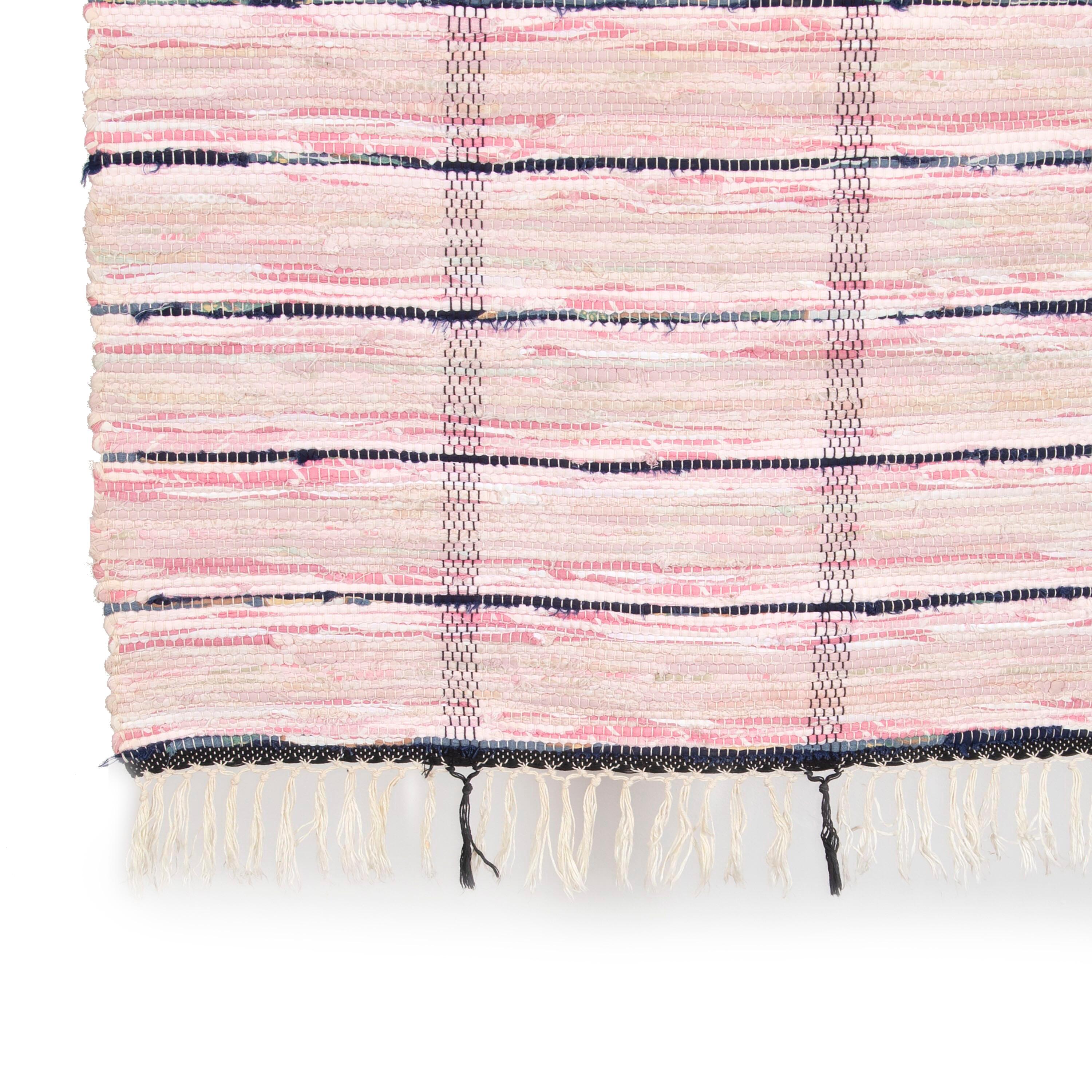 Swedish traditional rag rug in tones of pink, and ecru with a wide striped design throughout. This rug has long proportions, ideal for use within a hallway or corridor. It features a dense pattern in a range of colours that have mellowed beautifully