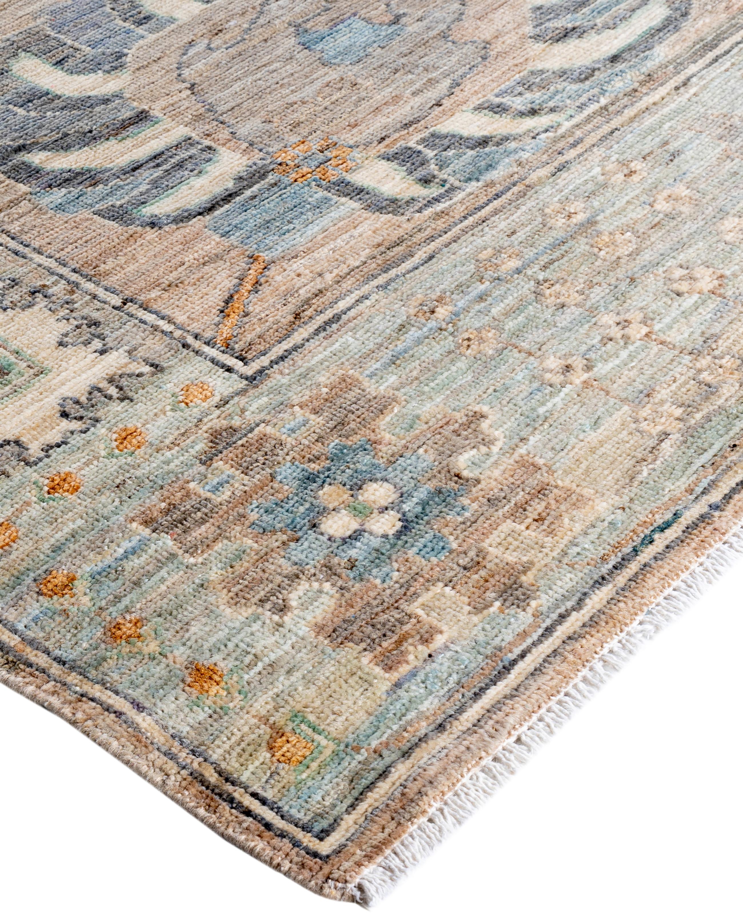 Oushak rugs are known for their soft, muted color palettes and large-scale, flowing designs. They often feature soft tones like beige, cream, gold, and light blue, with motifs that include palmettes, vines, and geometric shapes. These rugs are